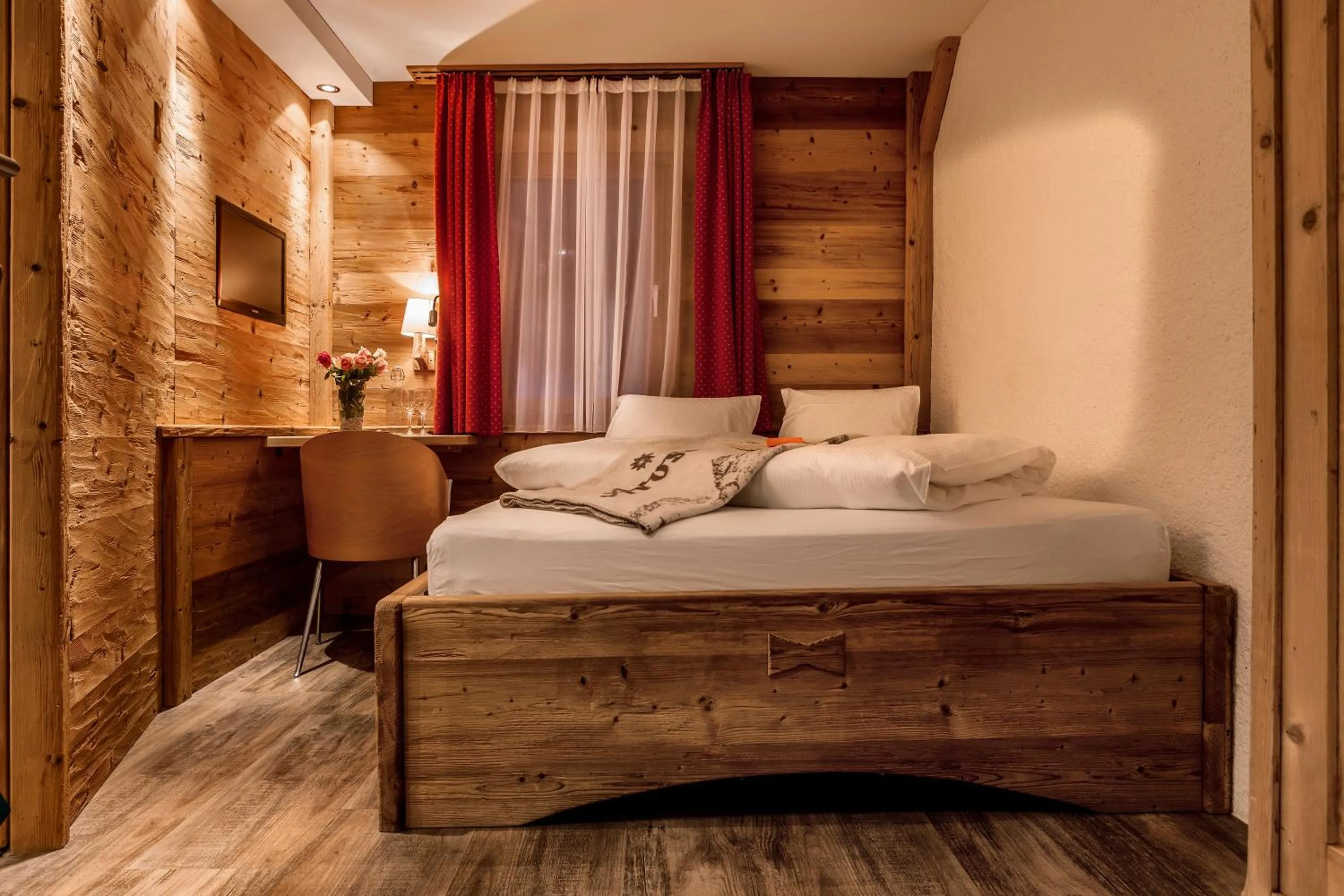 Bed in Arosa Vetter Hotel