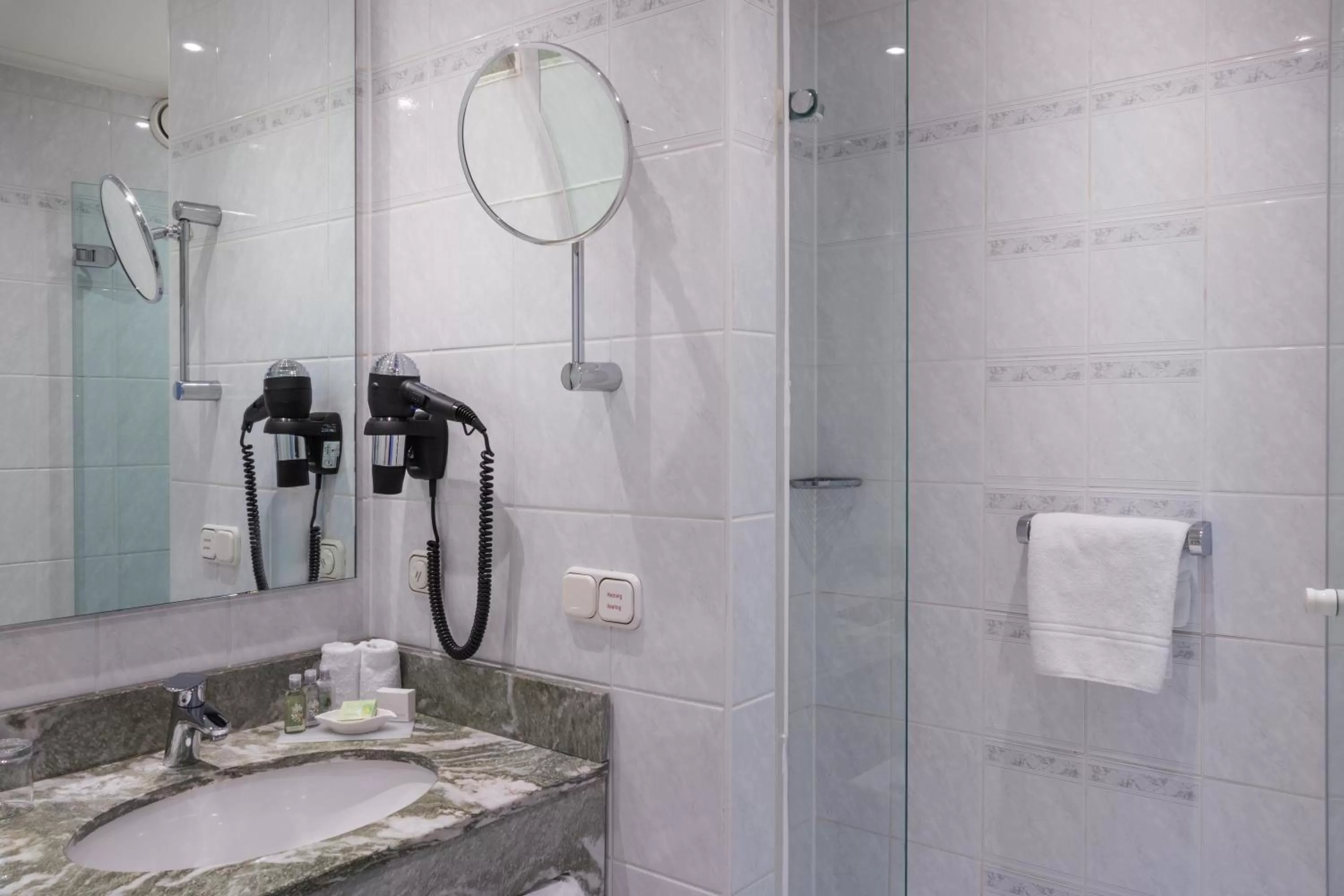 Bathroom in Crowne Plaza Frankfurt Congress Hotel by IHG