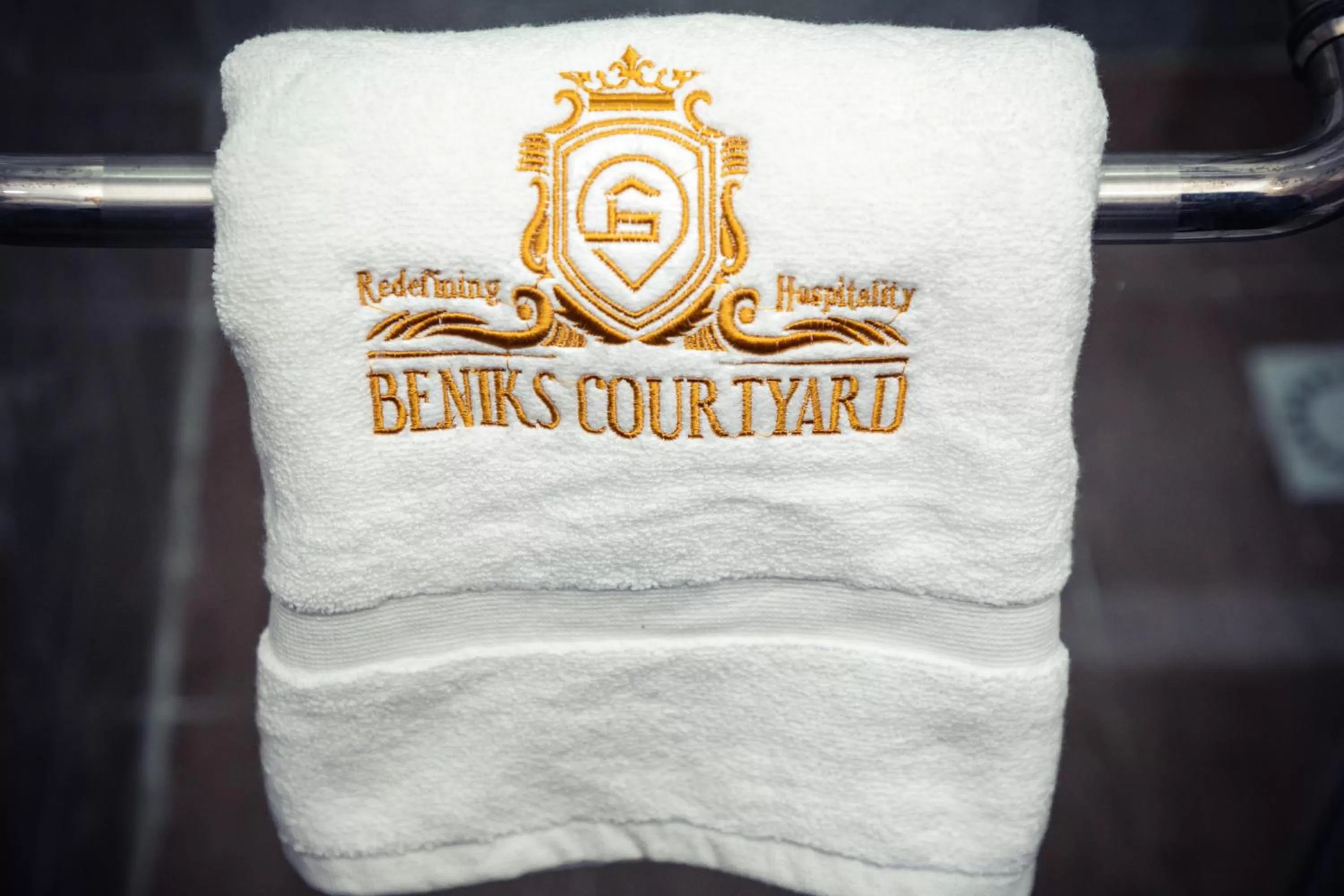 towels, Property Logo/Sign in Beniks courtyard Hotel