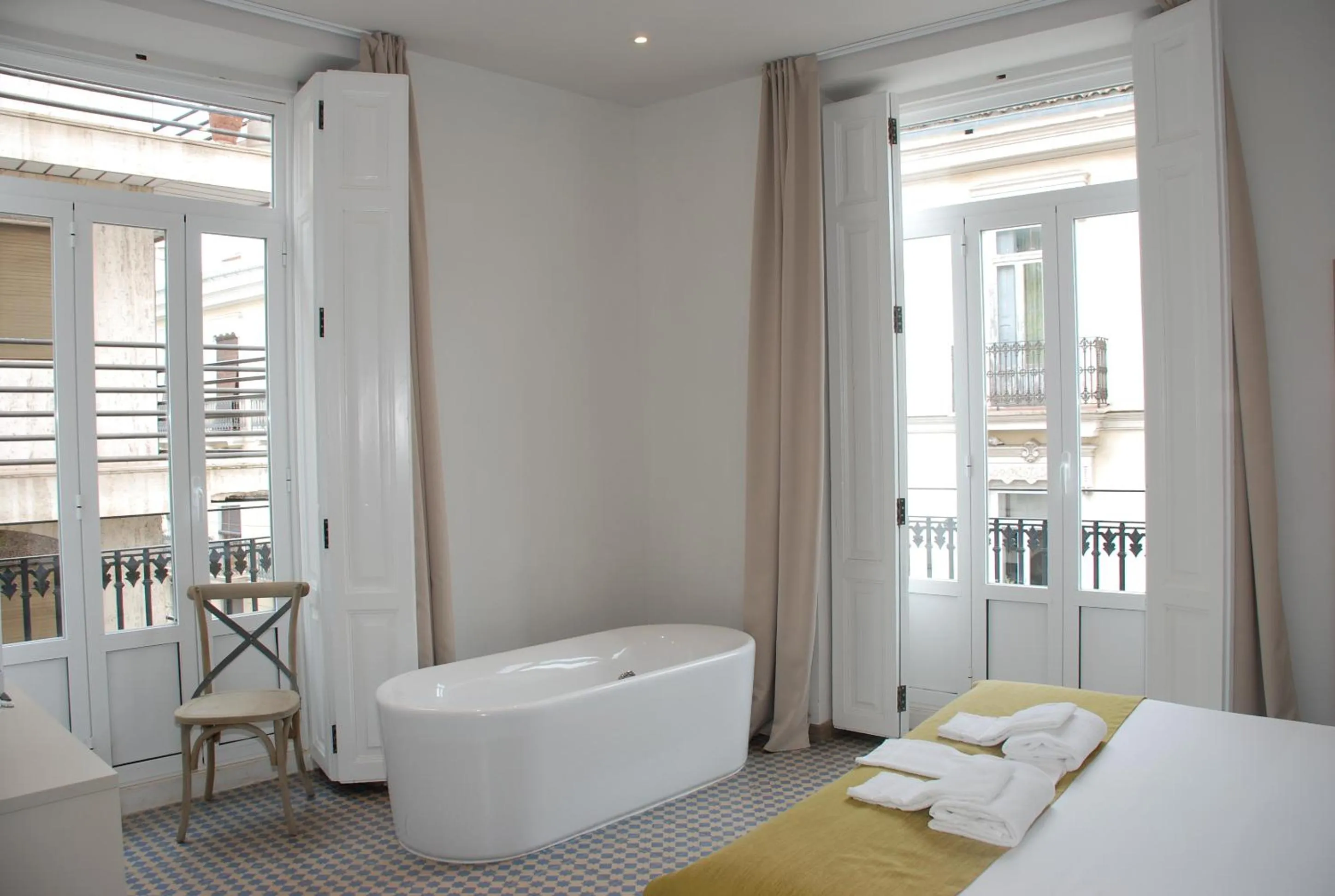 Photo of the whole room, Bed in Hotel San Lorenzo Boutique Plaza