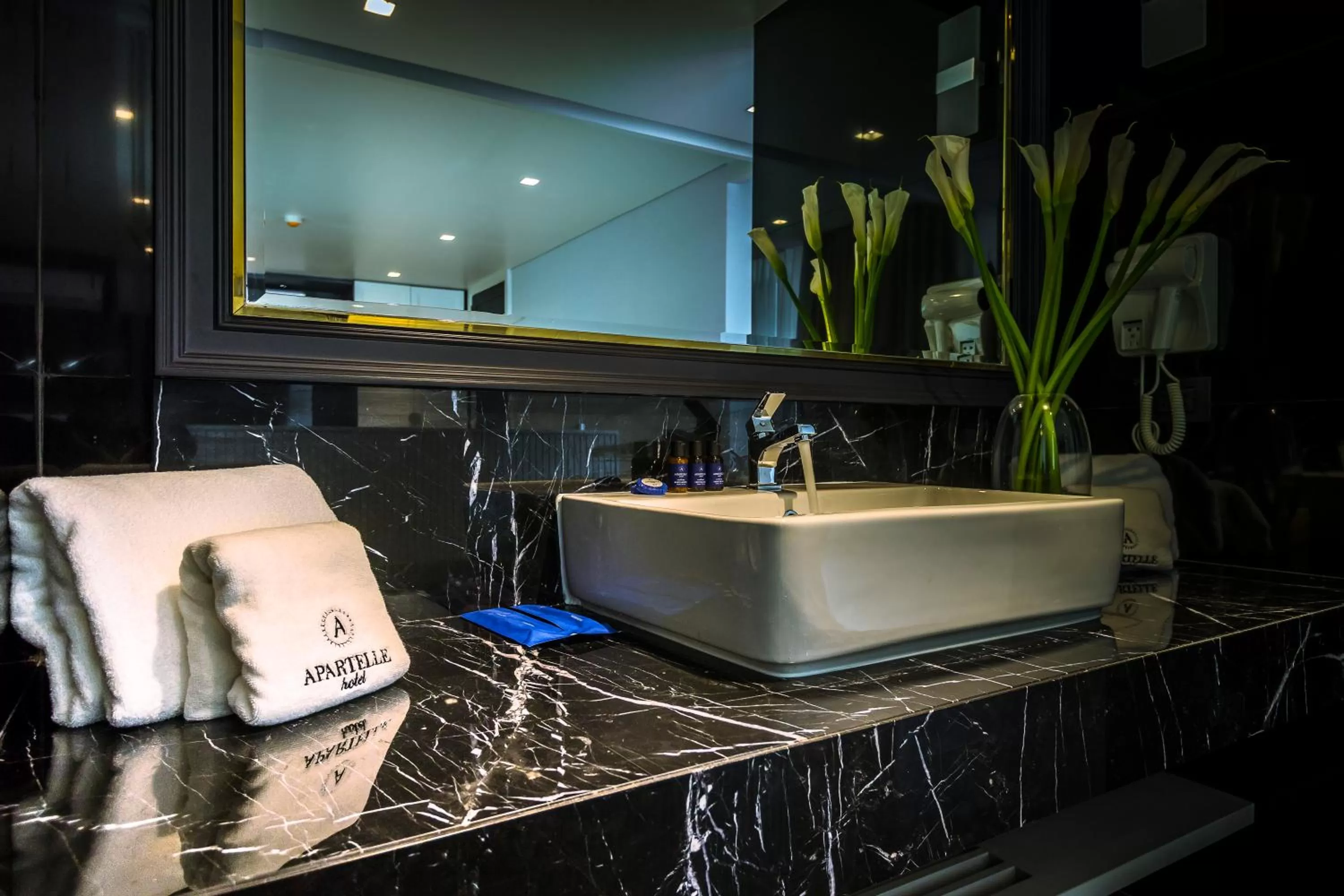 Bathroom in Apartelle Jatujak Hotel