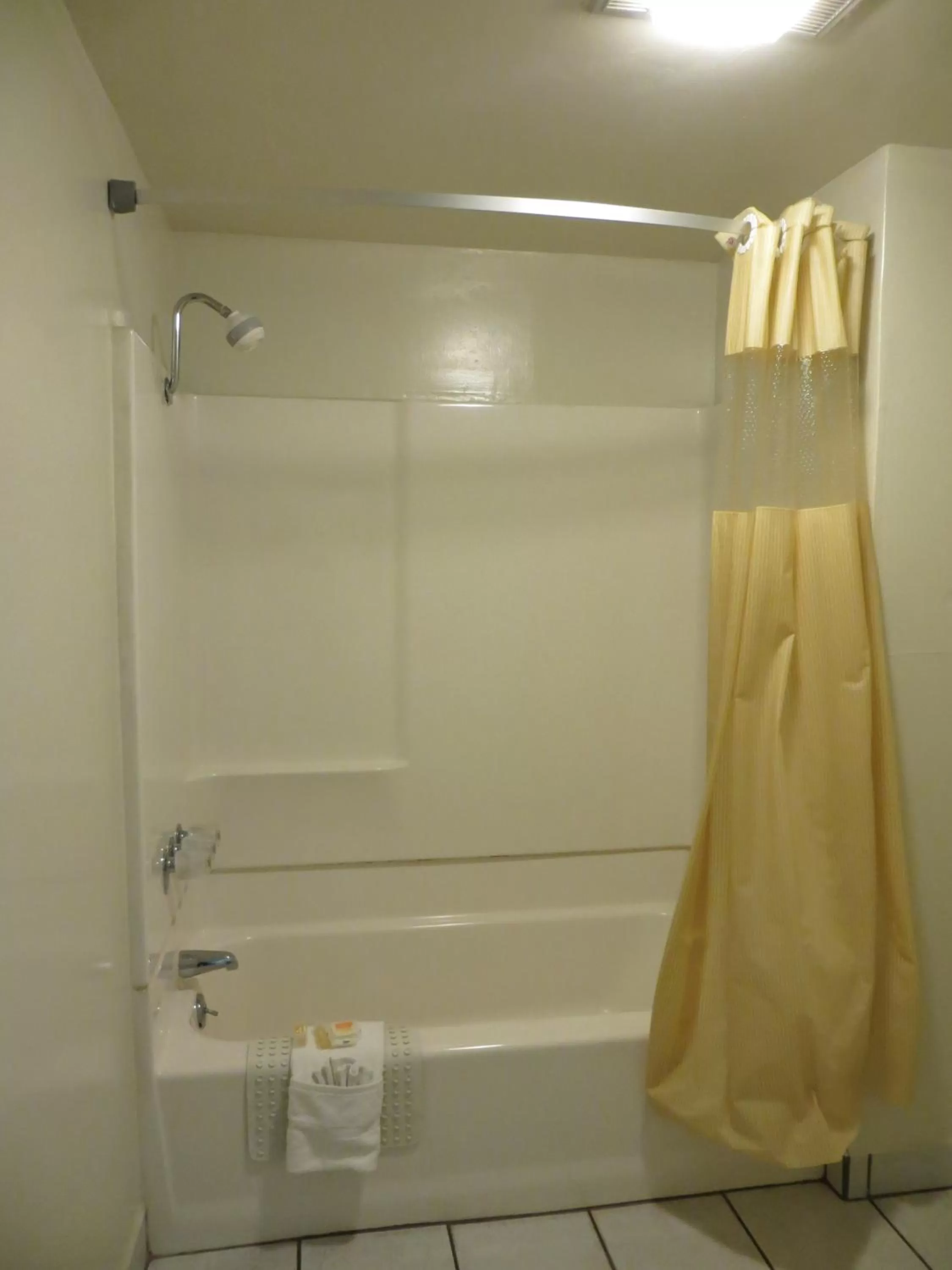 Bathroom in Days Inn by Wyndham Anaheim West