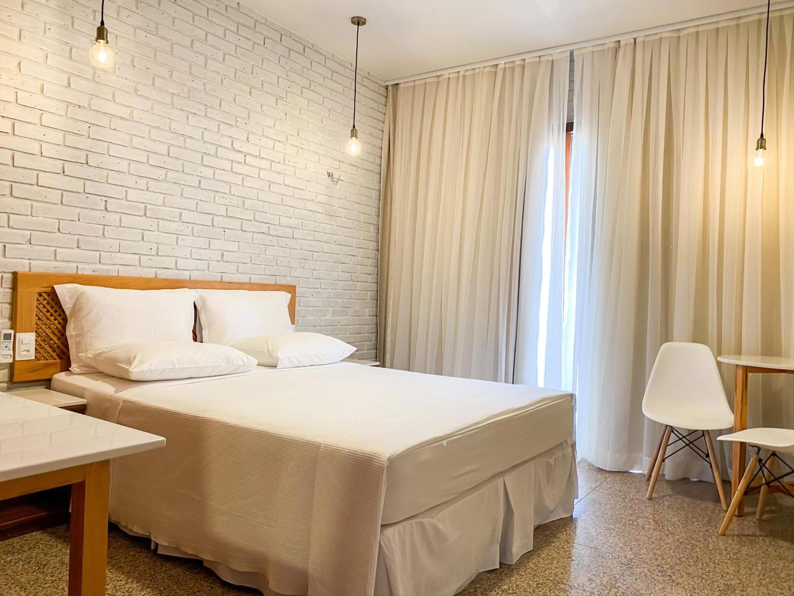 Bed in Hotel Vento Brasil