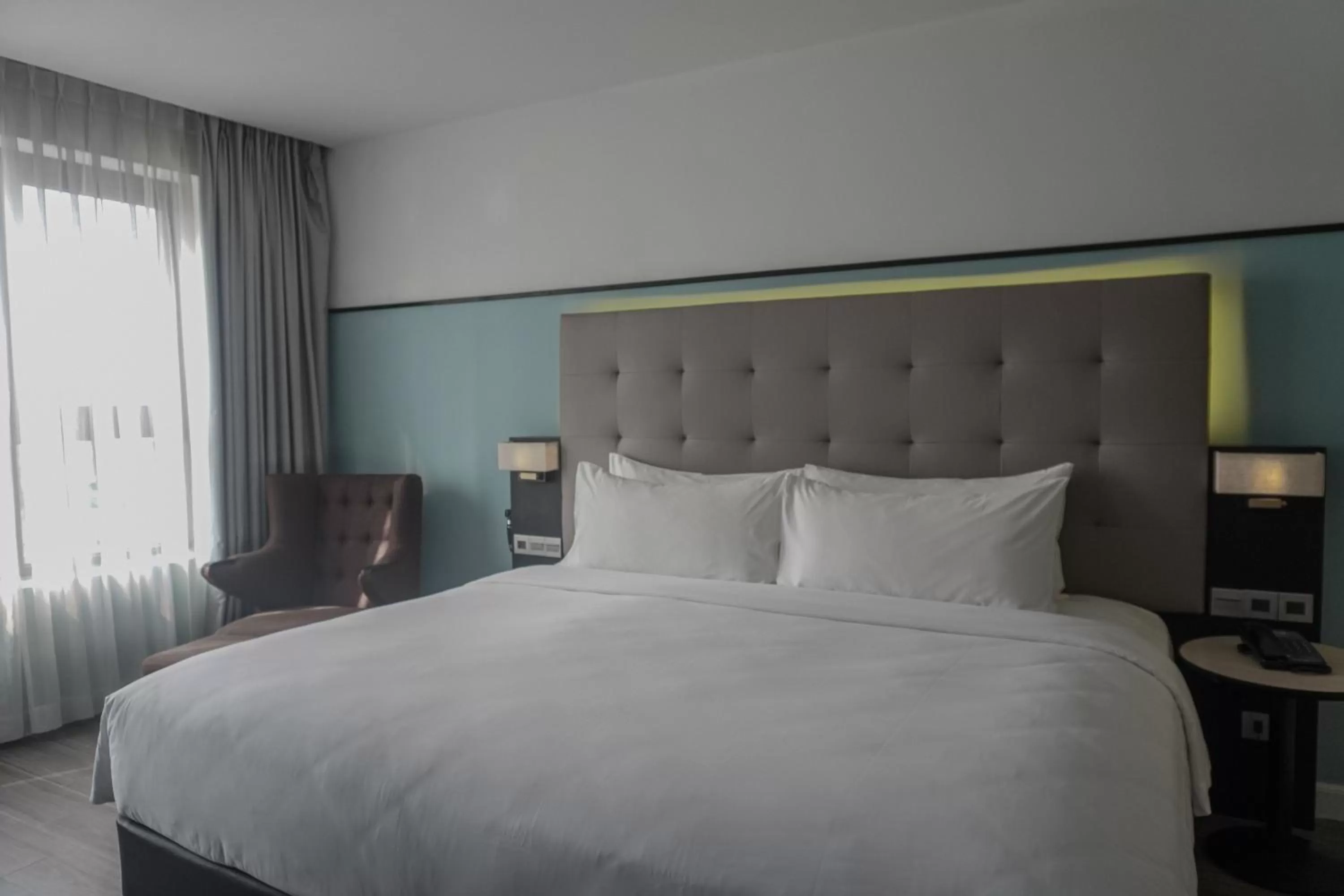 Bed in M Village Hotel Tôn Thất Đạm