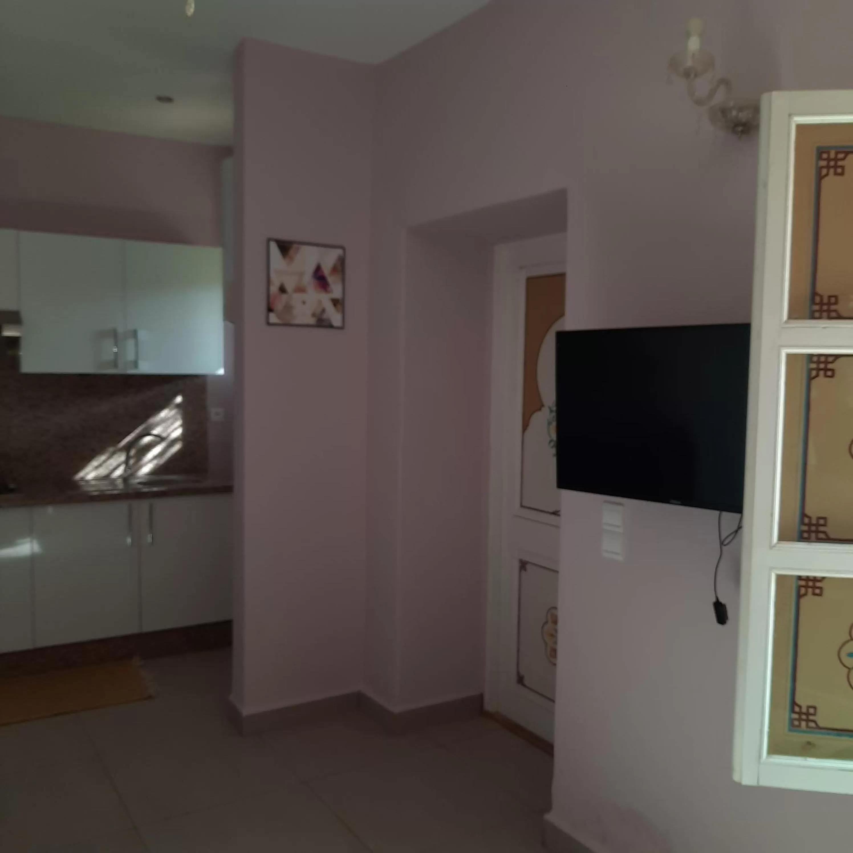 Facade/entrance, TV/Entertainment Center in Résidence Habiba