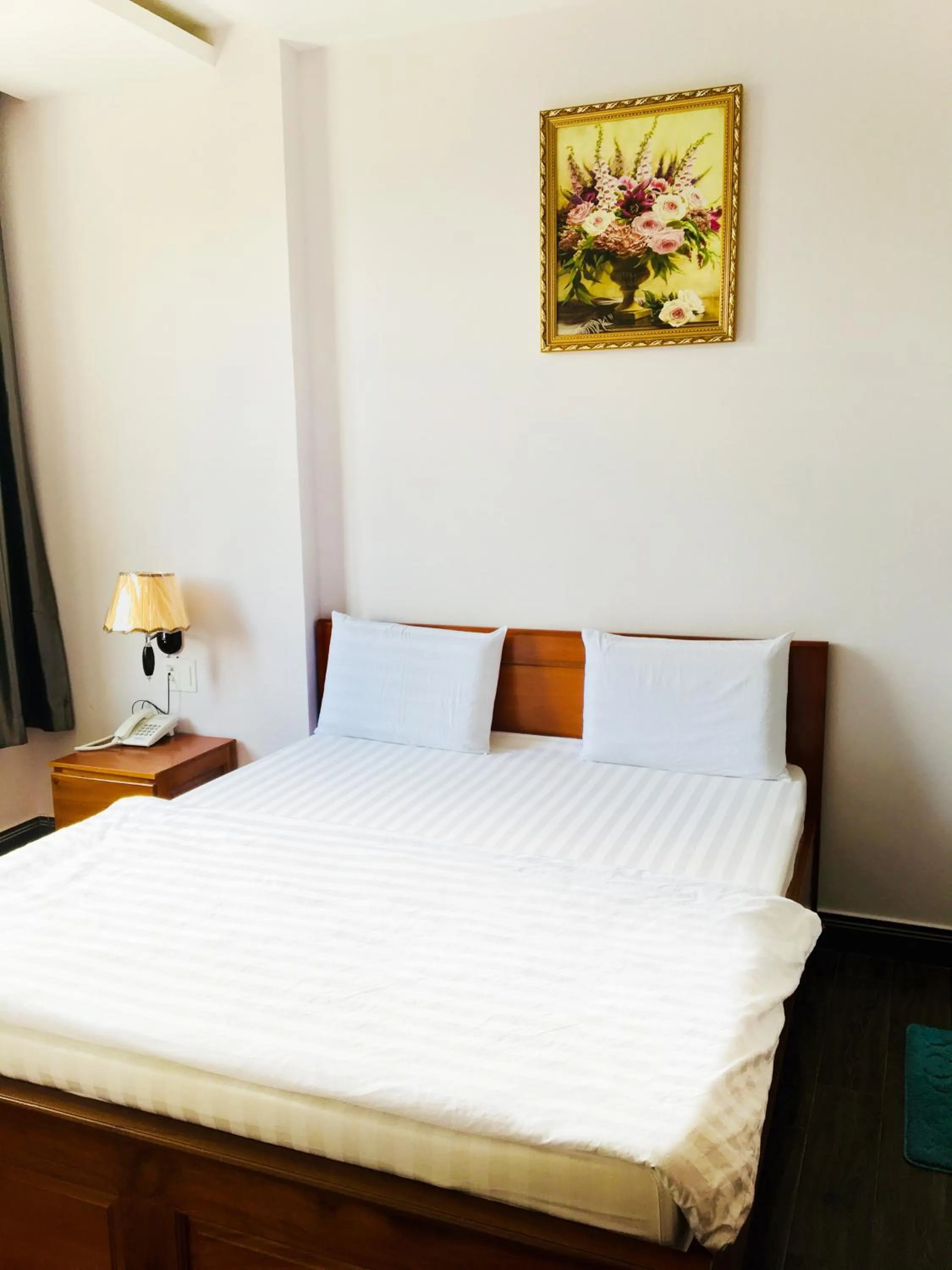 Bed in QUEEN VICTORIA Hotel