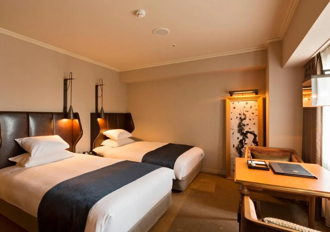 Bed in Royal Park Hotel Takamatsu