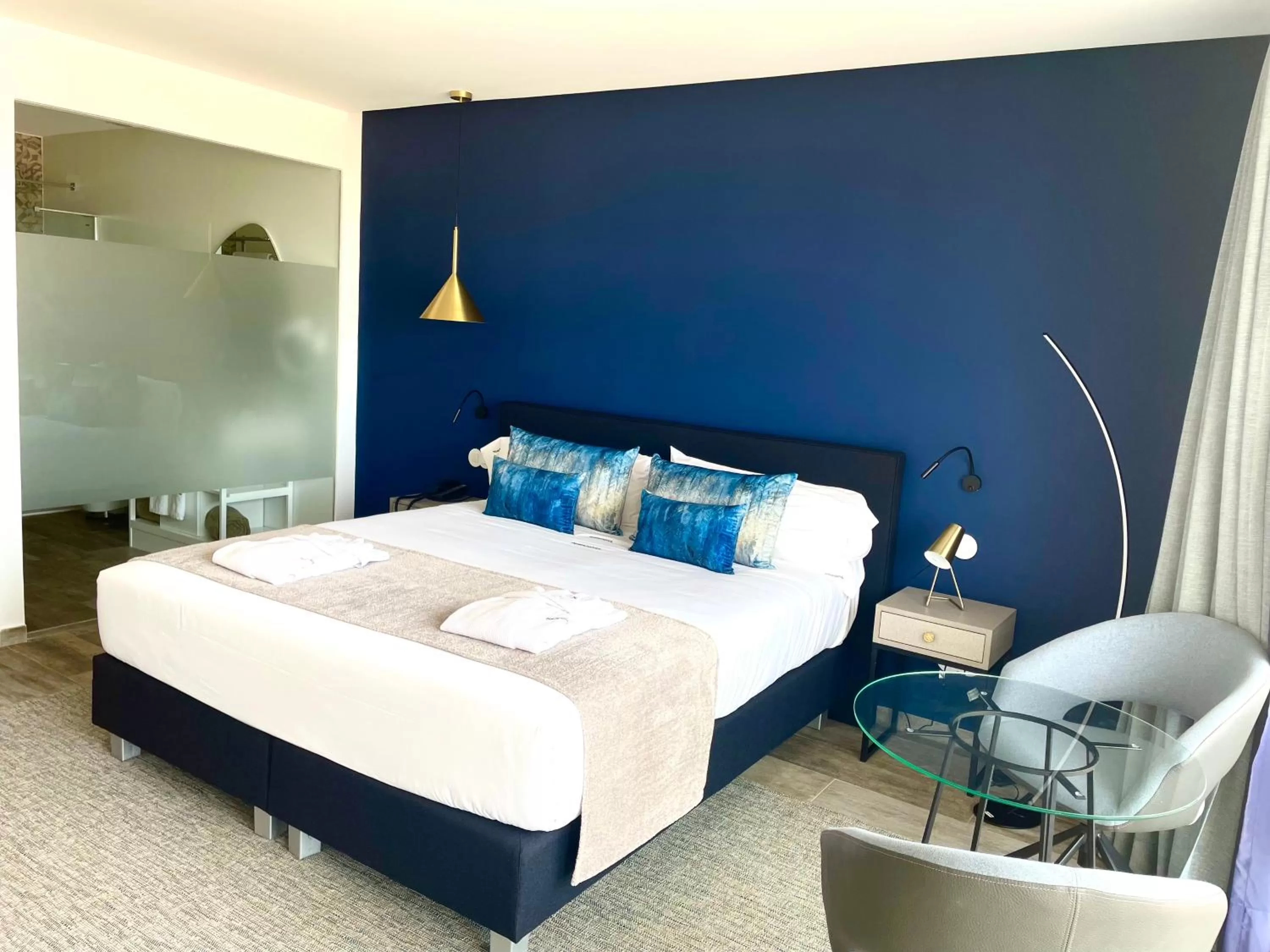 Bed in DESIGN SUITES Boutique Hotel - Adults Only