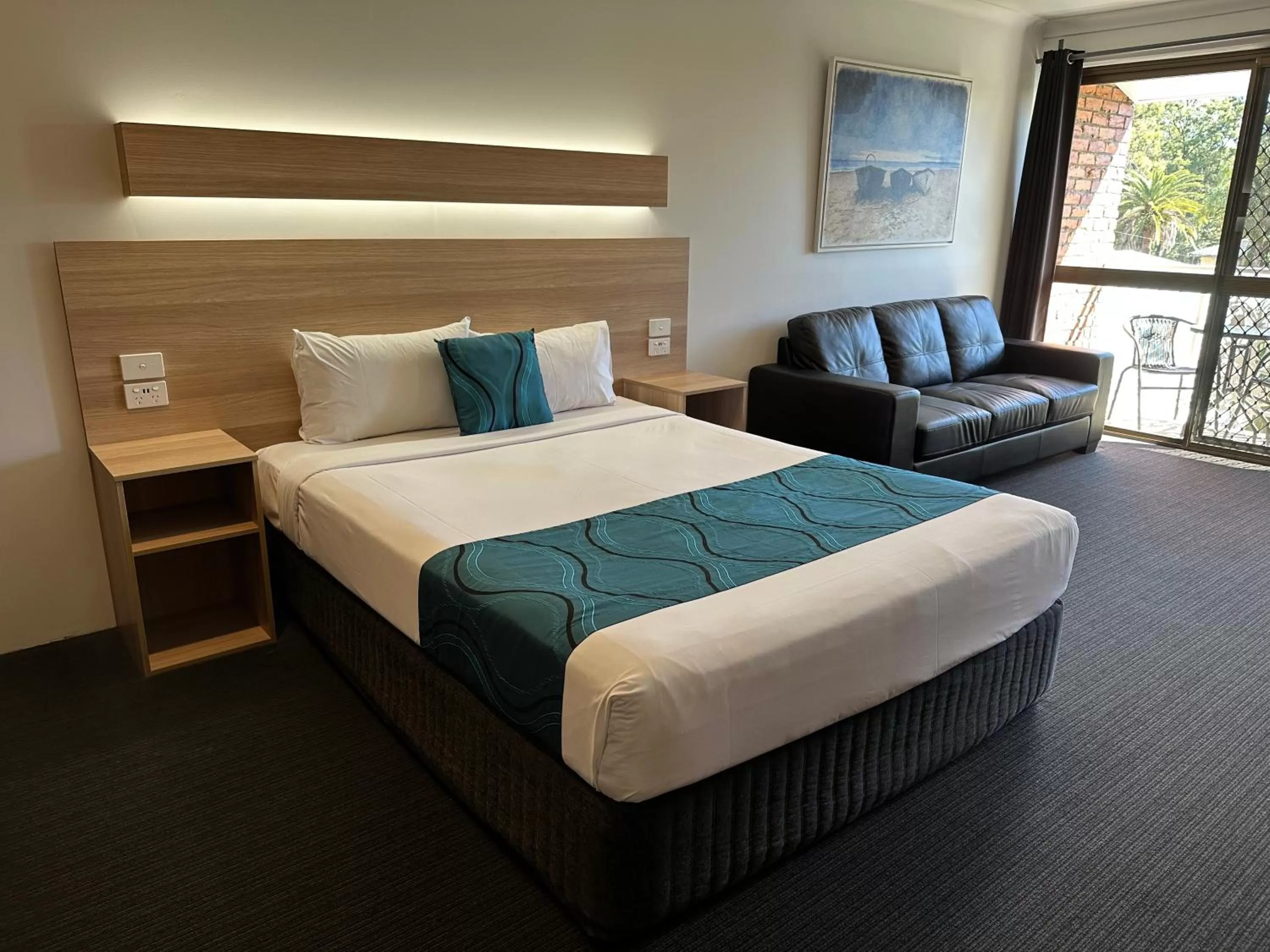 Bed in Logan City Motor Inn