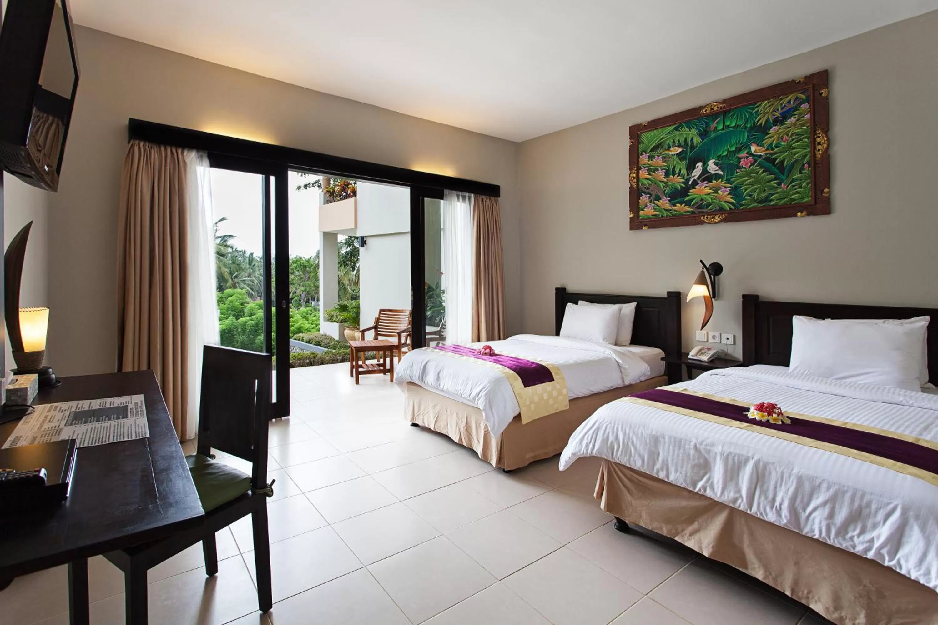 Bed in Kebun Villas & Resort