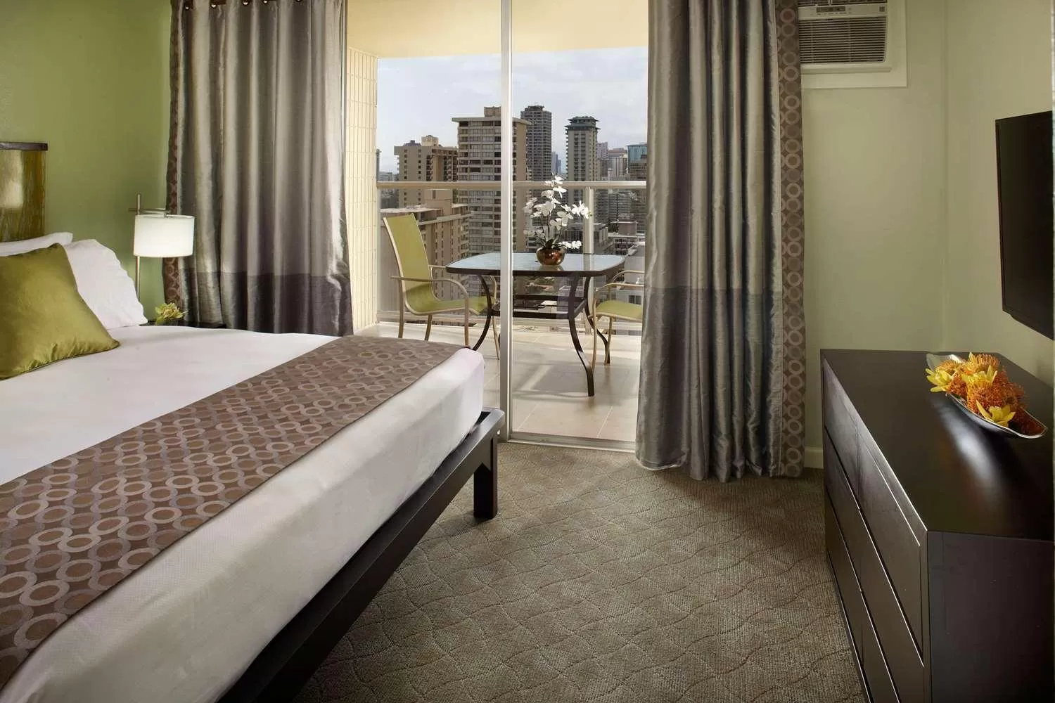 Bed in Skyline Island Colony Hotel