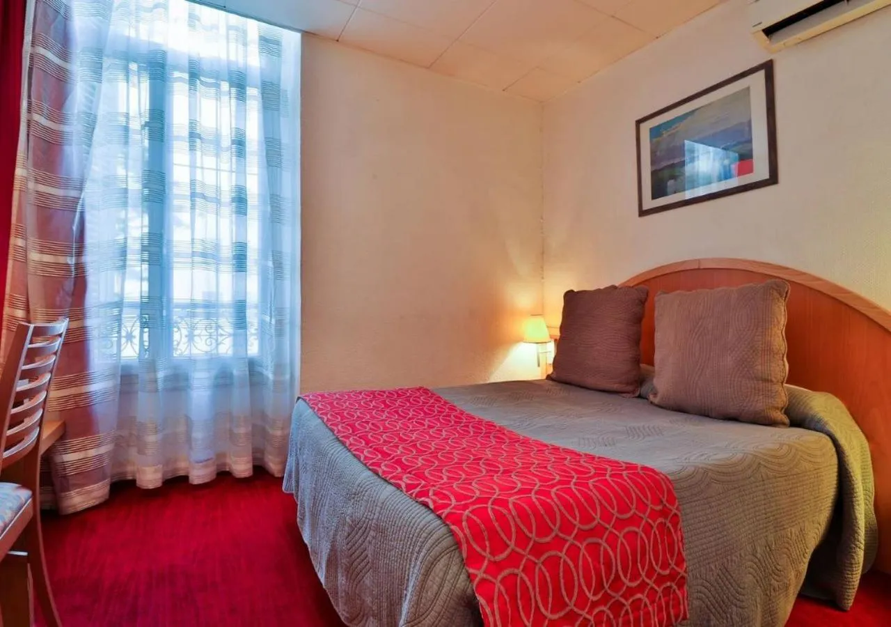 Bed in Hôtel restaurant Oasis