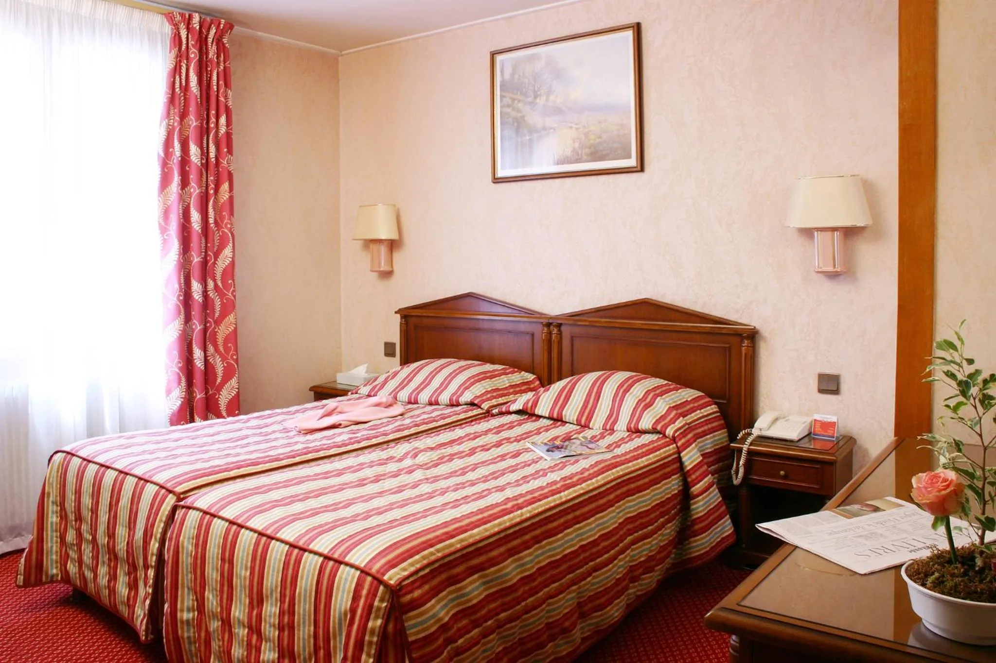 Bed in Hotel Meslay Republique