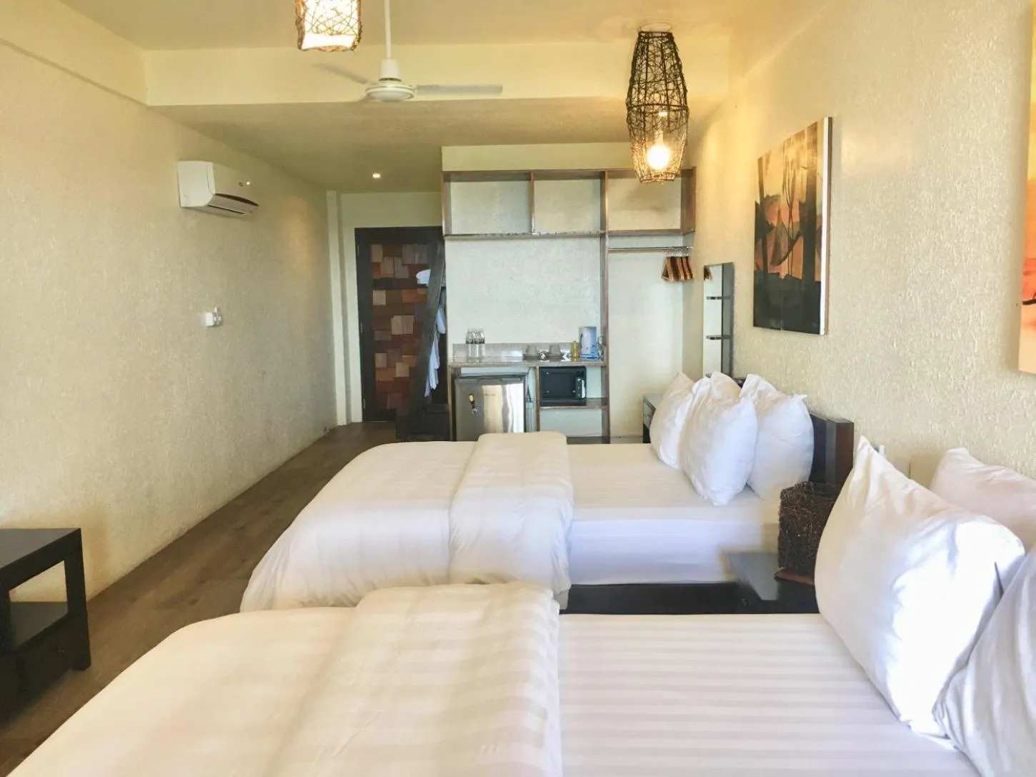 Photo of the whole room, Bed in Sunset At Aninuan Beach Resort