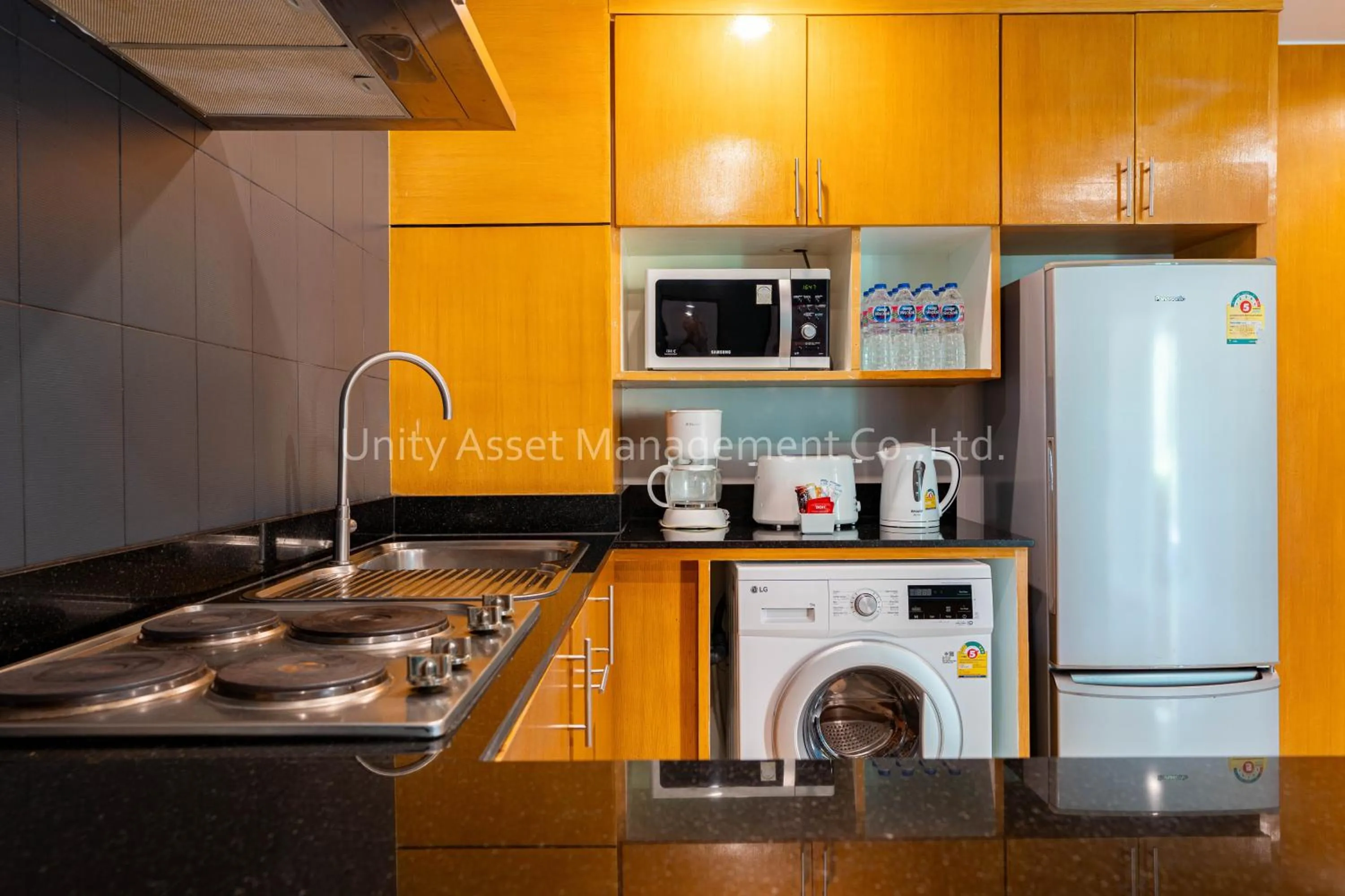 Kitchen or kitchenette in The Unity and The Bliss Patong Residence