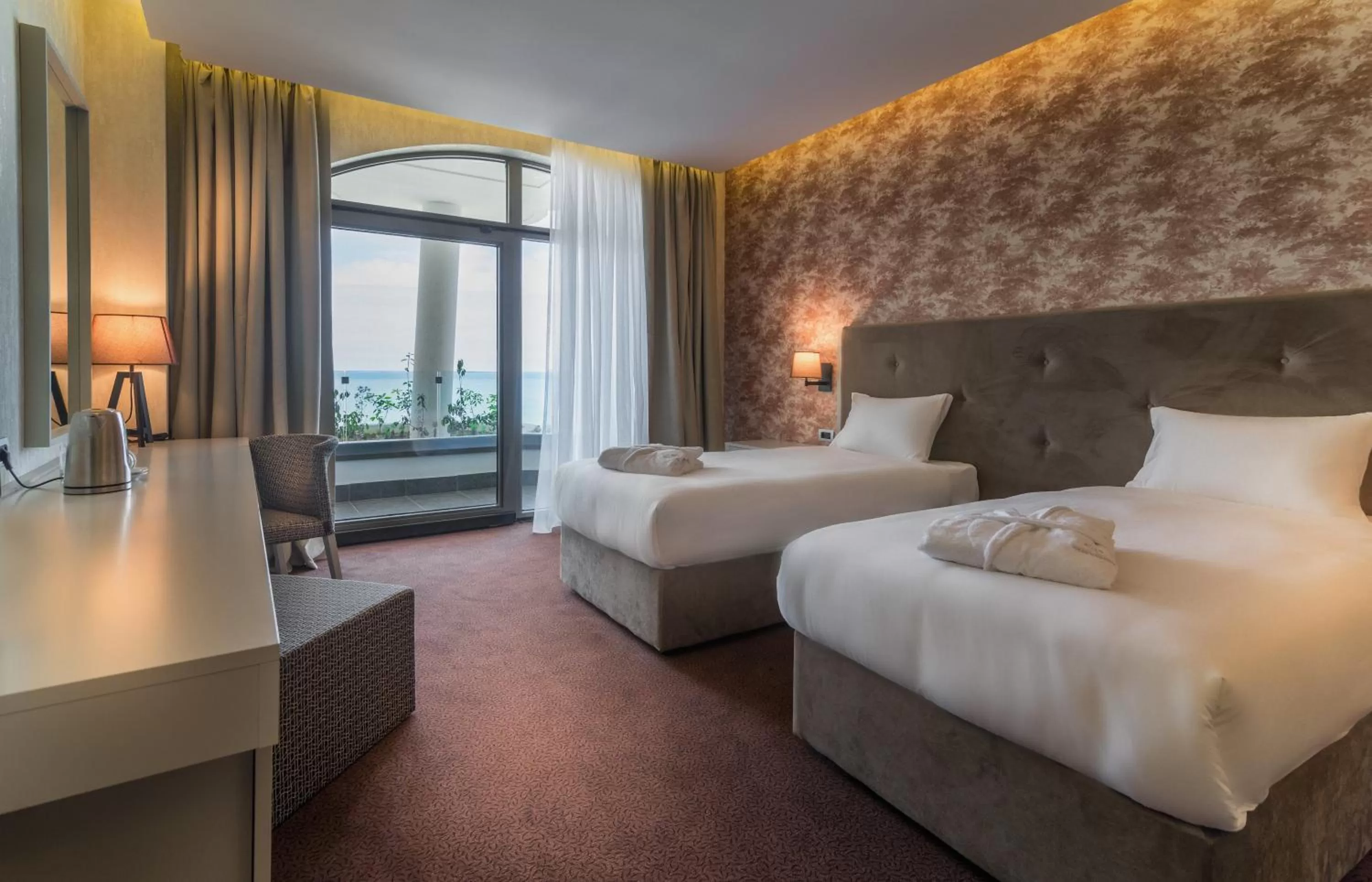 Photo of the whole room, Bed in The Grand Gloria Hotel