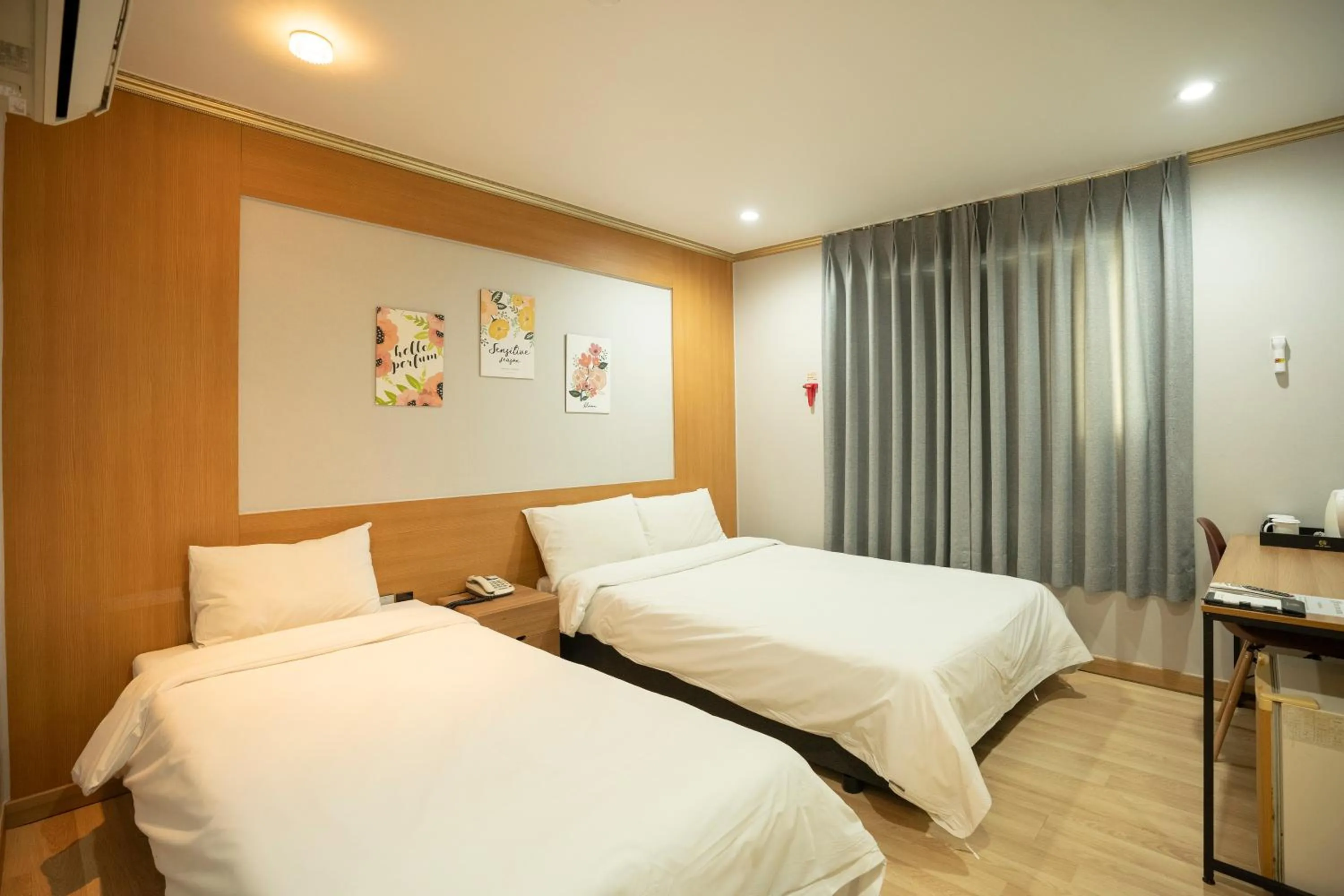 Bed in Jeju Stay Hotel