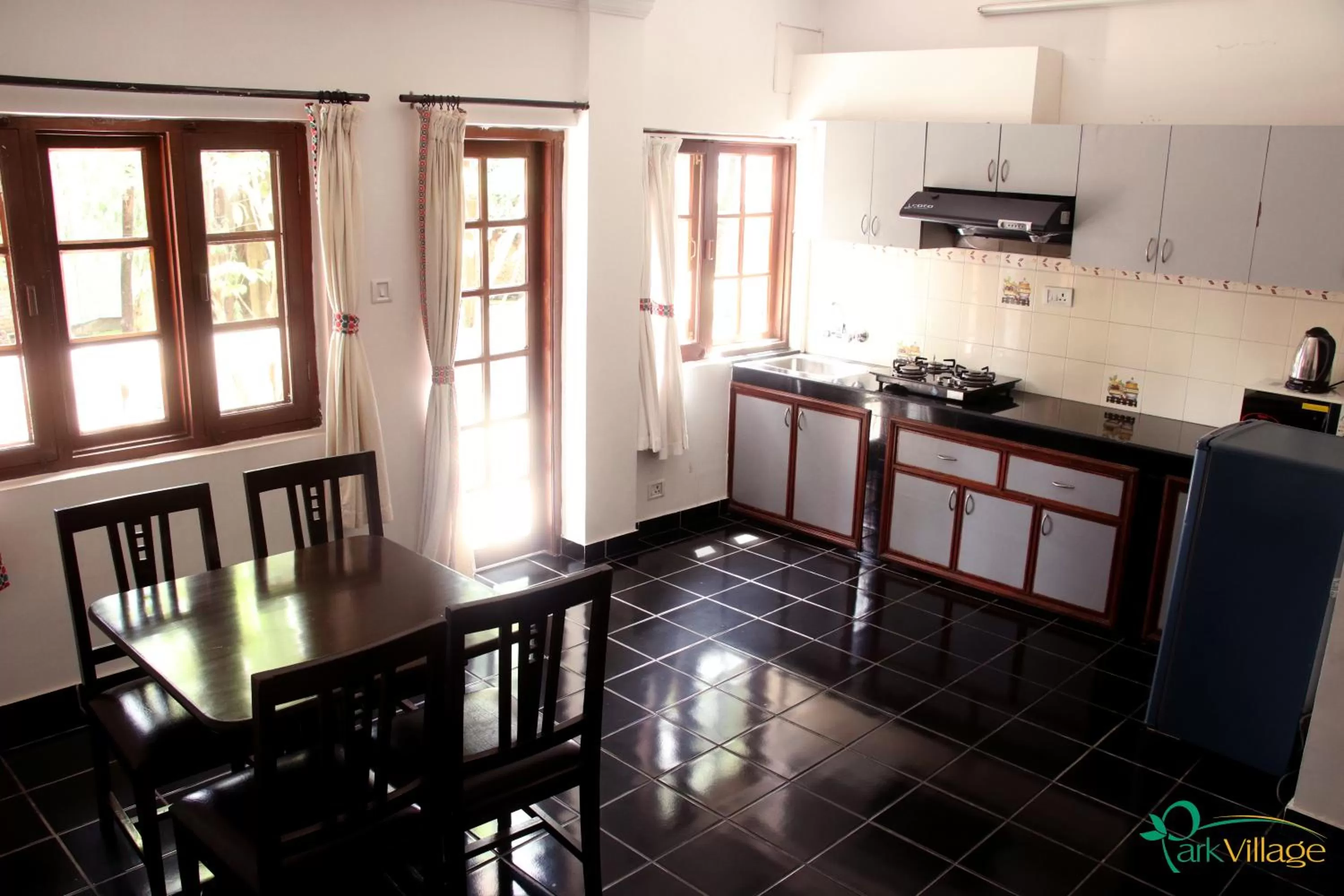 Kitchen or kitchenette in Park Village Resort by KGH Group