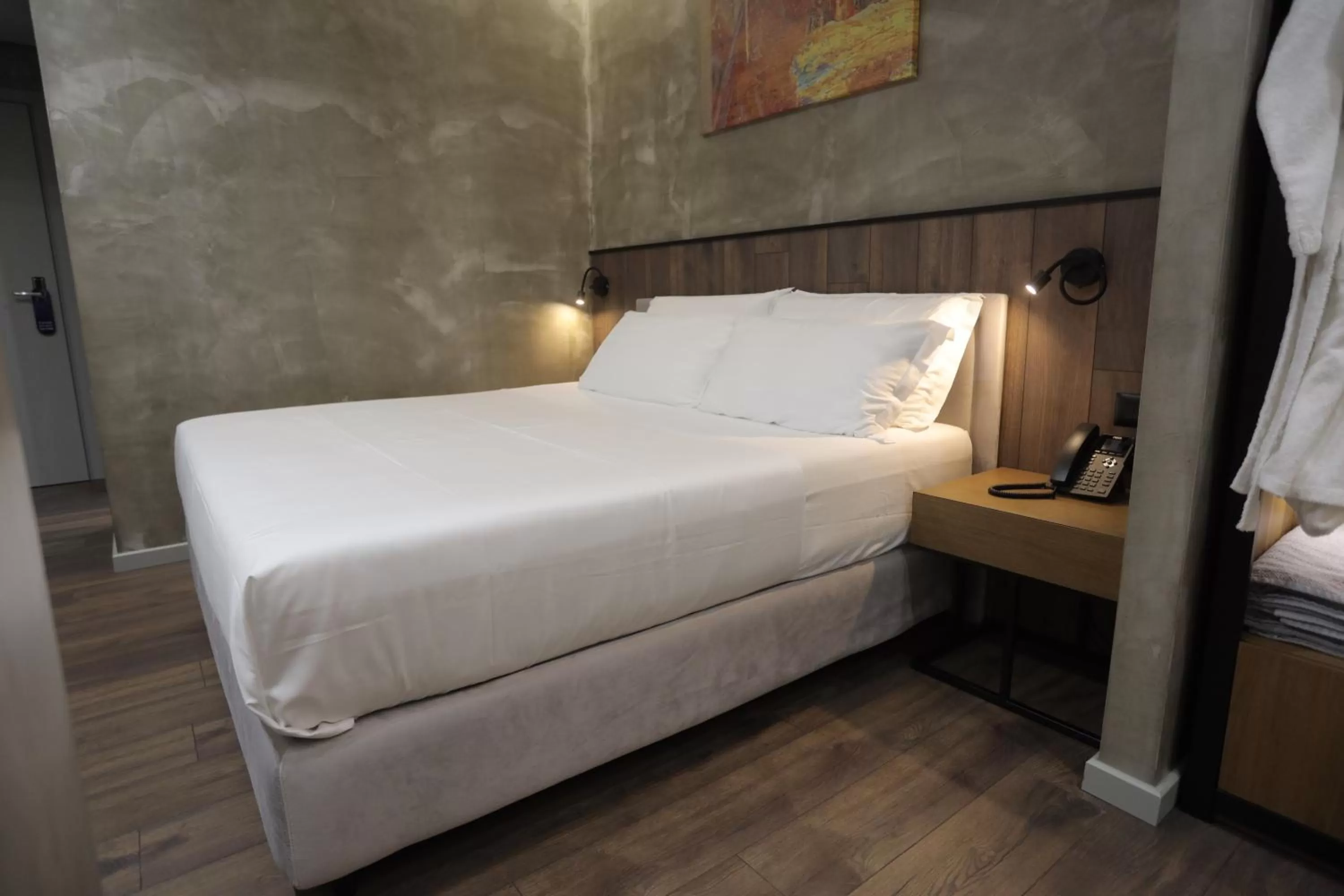 Bed in AP Hotel Boutique