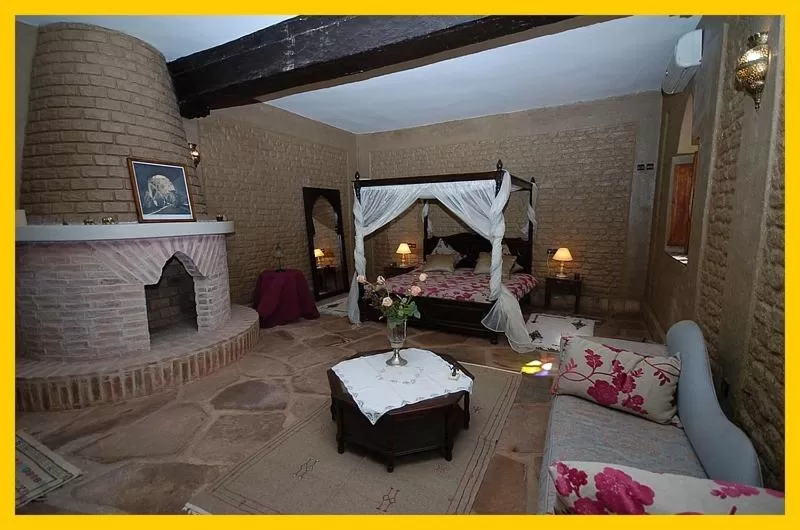 Photo of the whole room, Bed in La Rose Du Desert