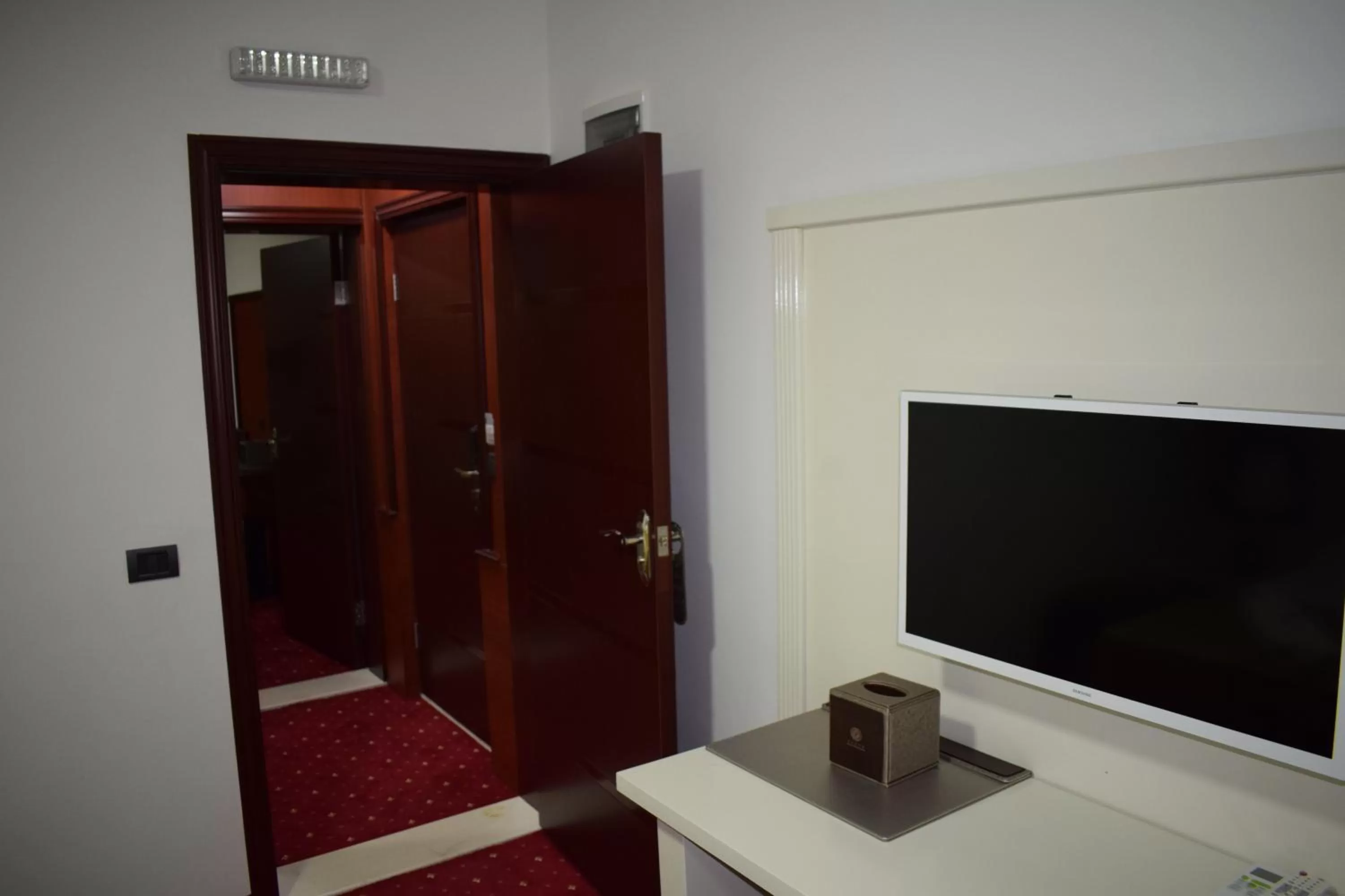 Photo of the whole room, TV/Entertainment Center in Petriti & Spa