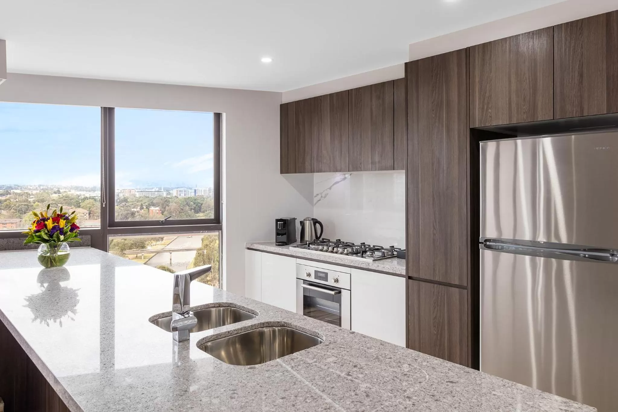 Kitchen or kitchenette in Meriton Suites Church Street, Parramatta
