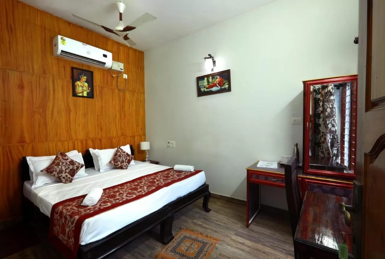 Bed in Ideal Ayurvedic Resort Kovalam