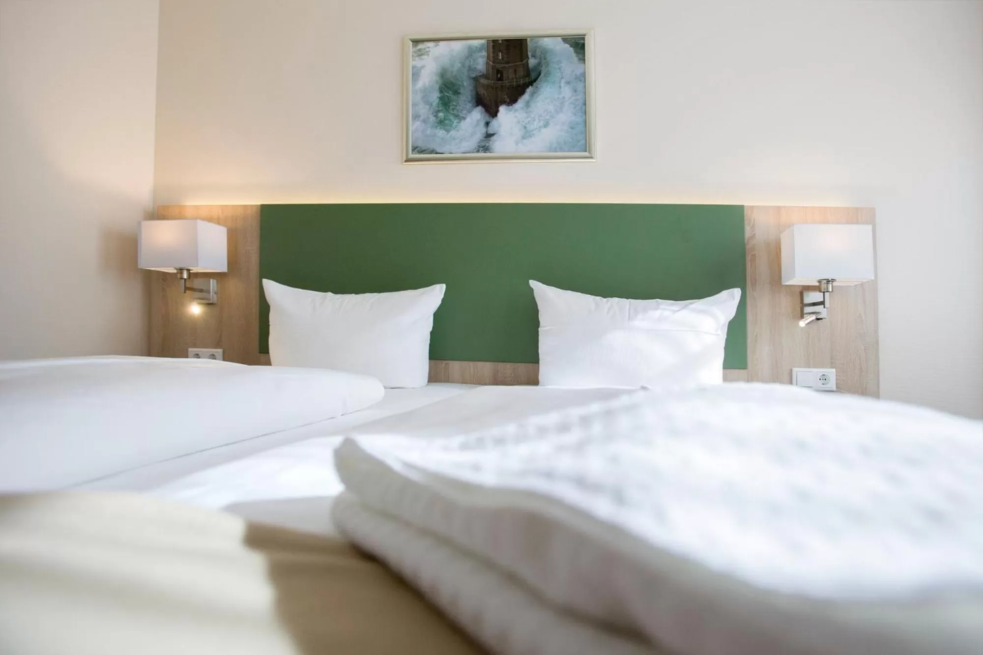 Photo of the whole room, Bed in Nordsee-Hotel Hinrichsen