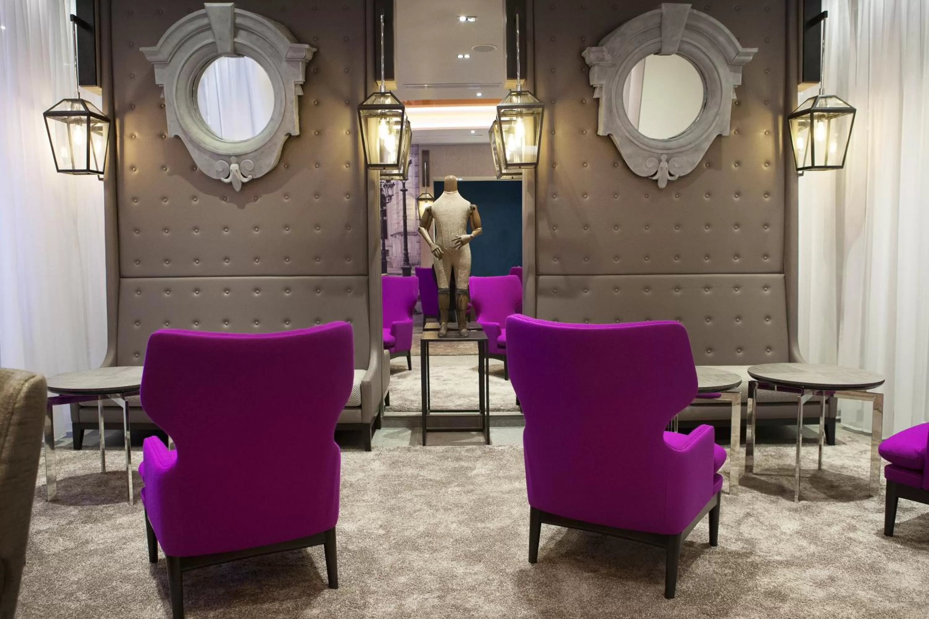 Communal lounge/ TV room in Hotel La Lanterne & Spa By Timhotel