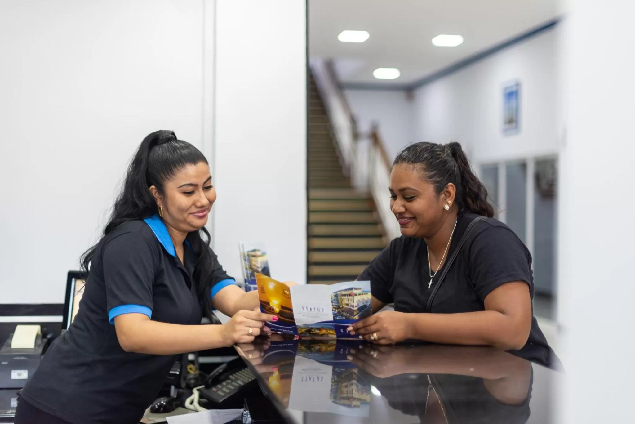 Staff in Status International Hotel