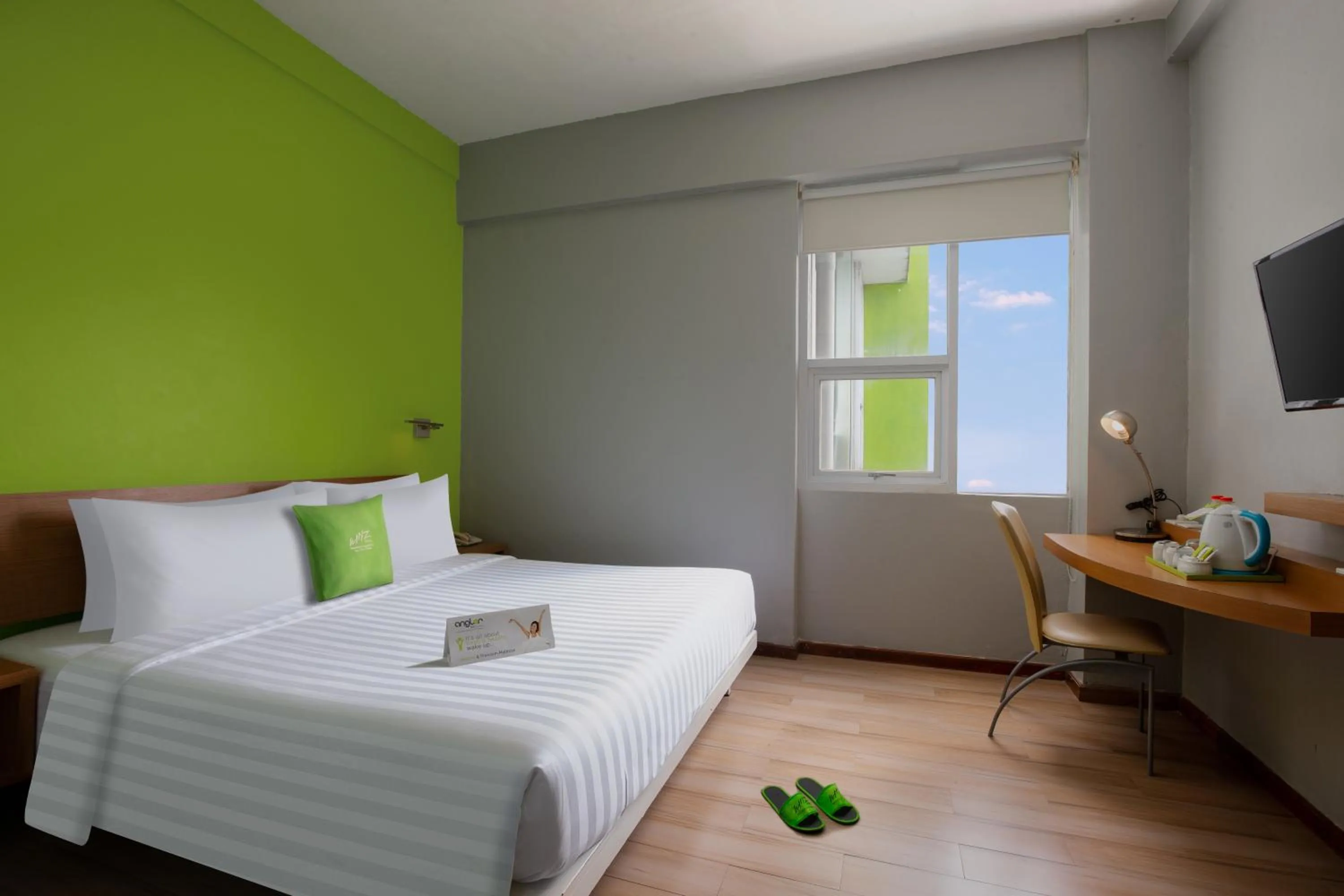 Bedroom, Bed in Whiz Hotel Malioboro Yogyakarta