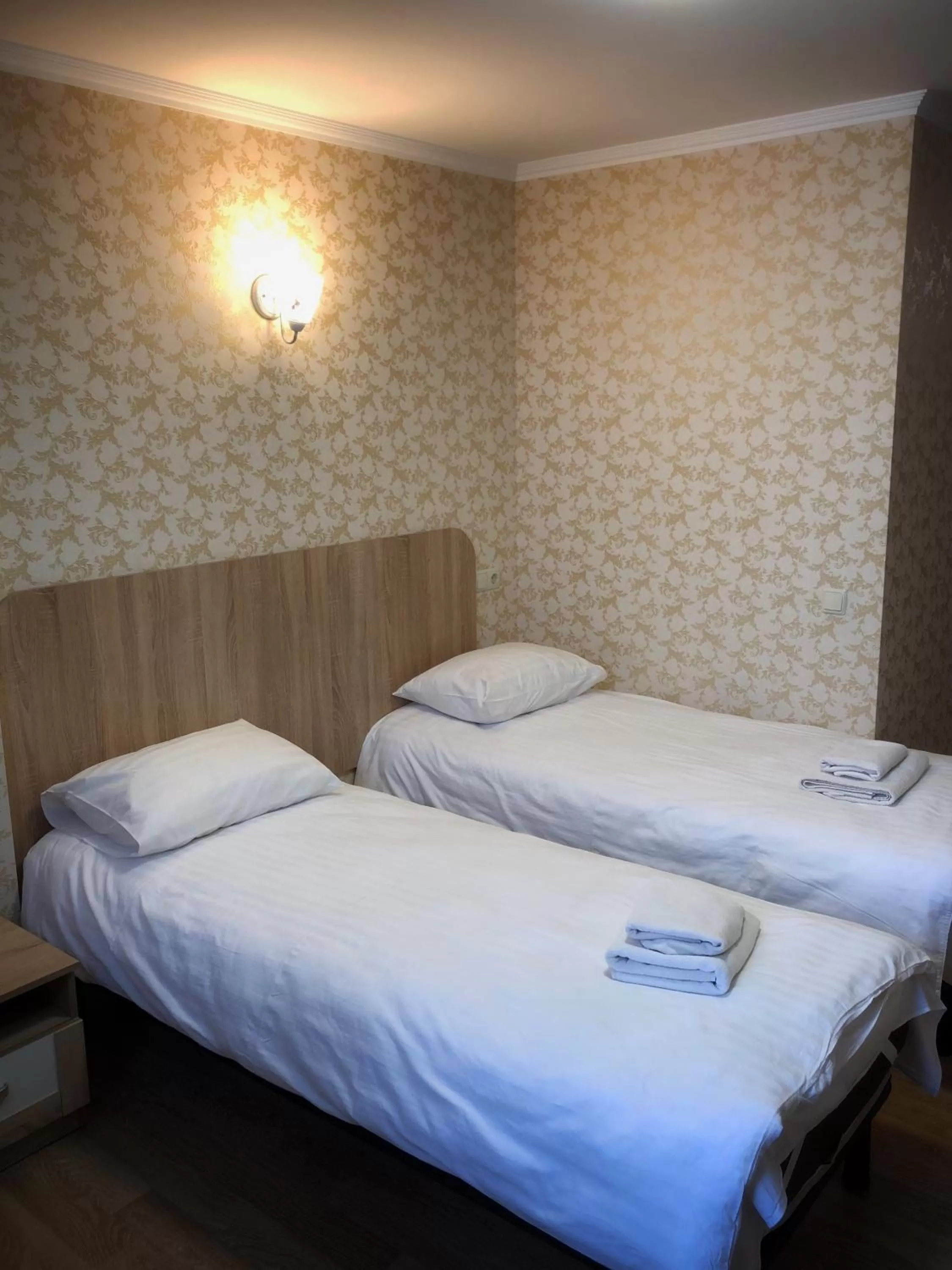 Bed in Zhuliany City Hotel