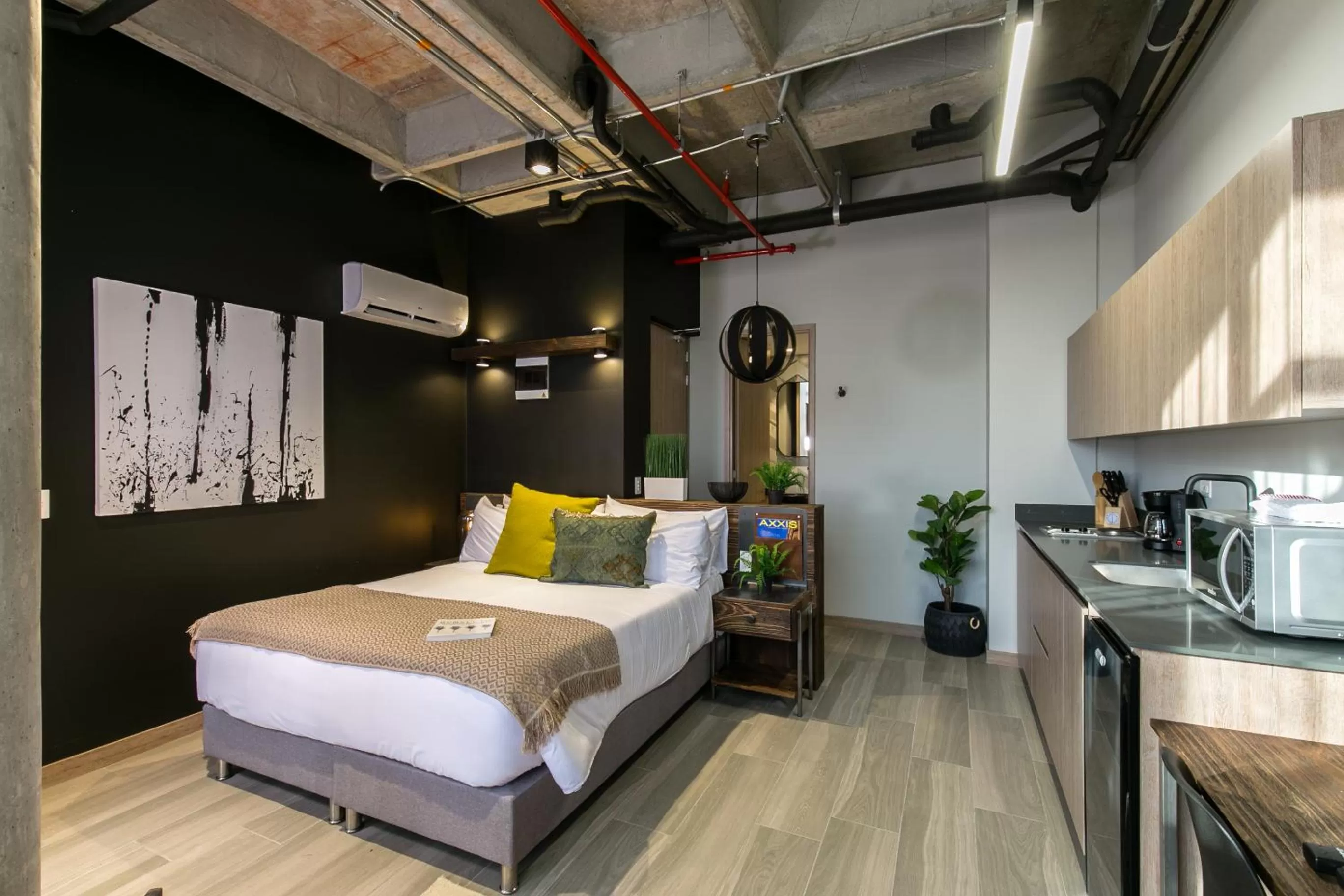 Kitchen or kitchenette, Bed in Factory Lofts Hotel