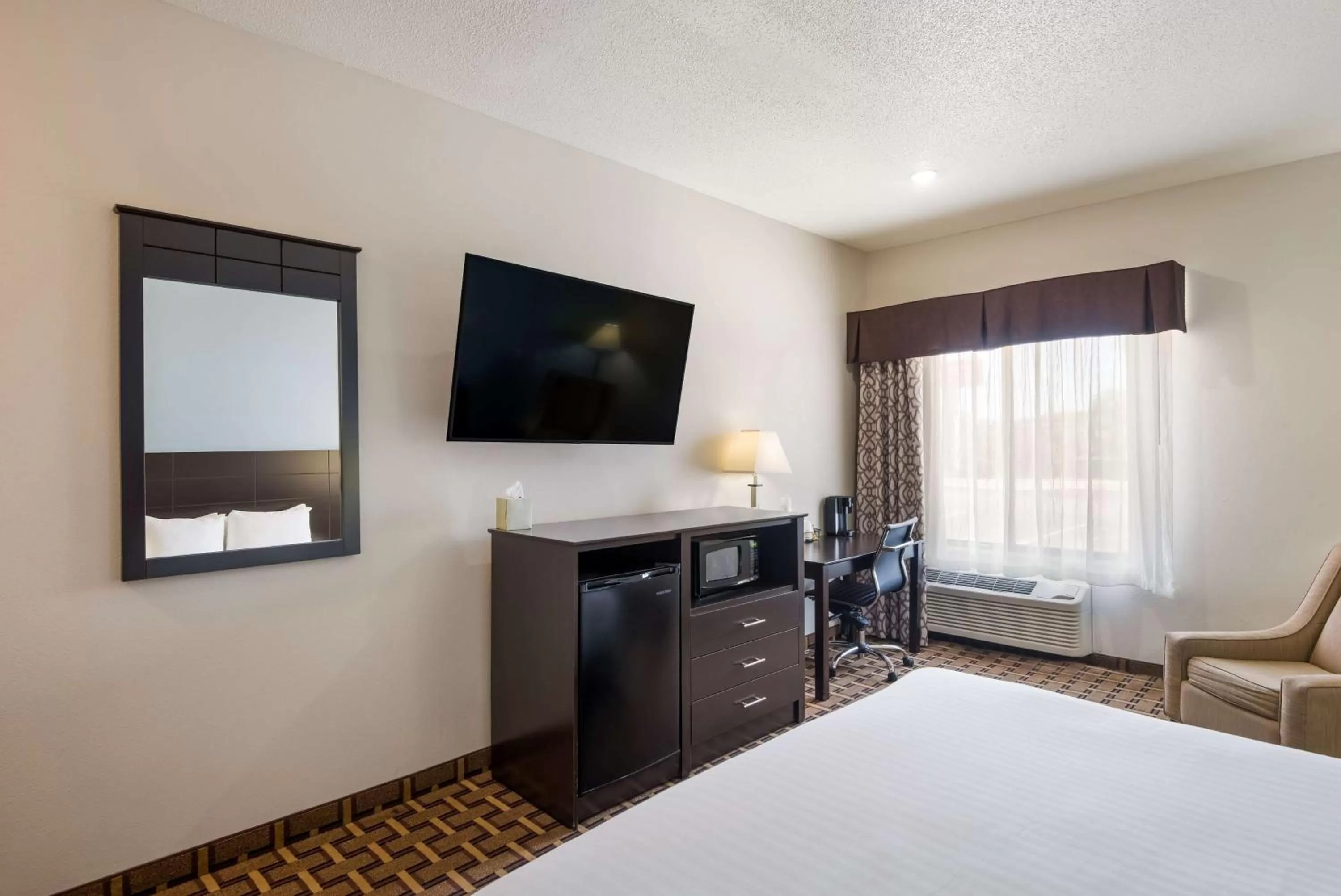 Bedroom, Bed in SureStay Plus Hotel by Best Western Coralville Iowa City