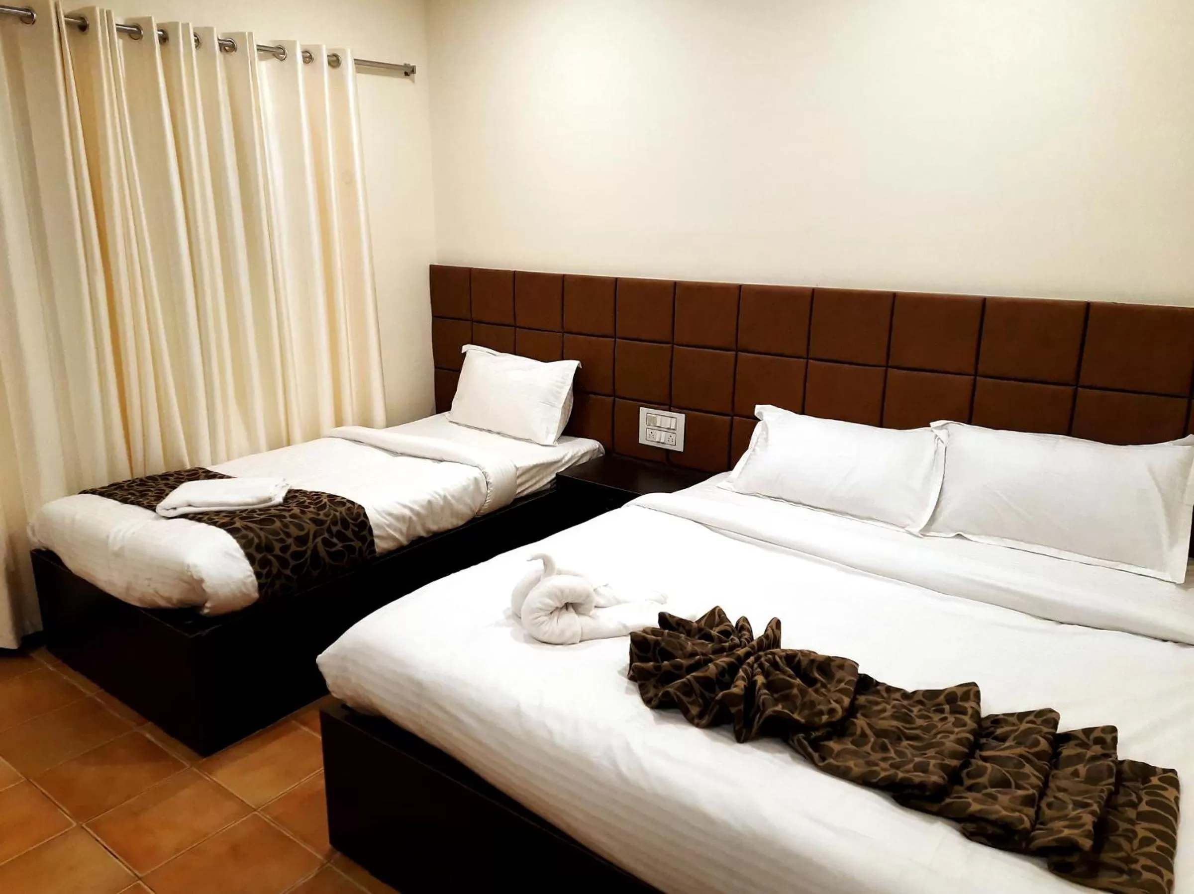 Bed in GRAND KODAI SR INN
