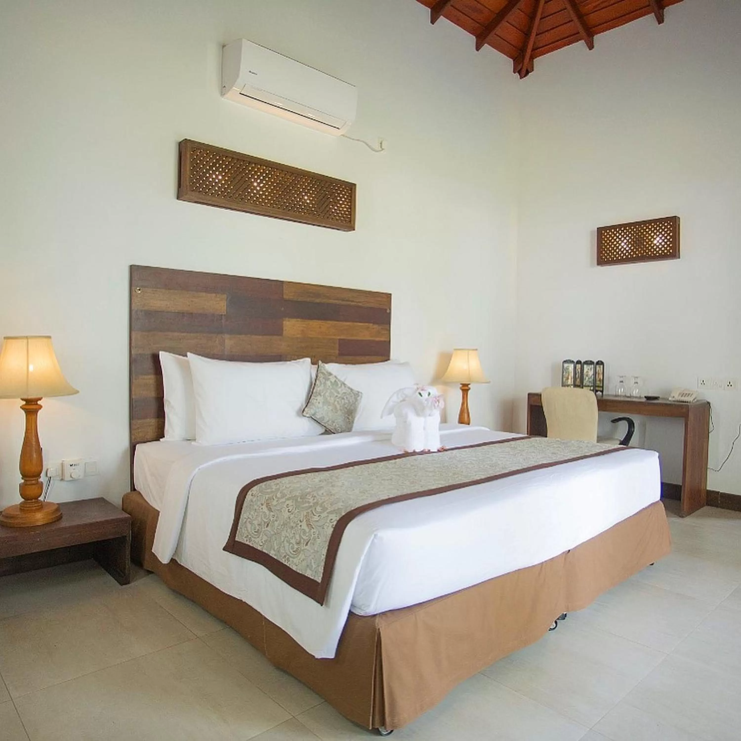 Bed in Amaluna Resorts