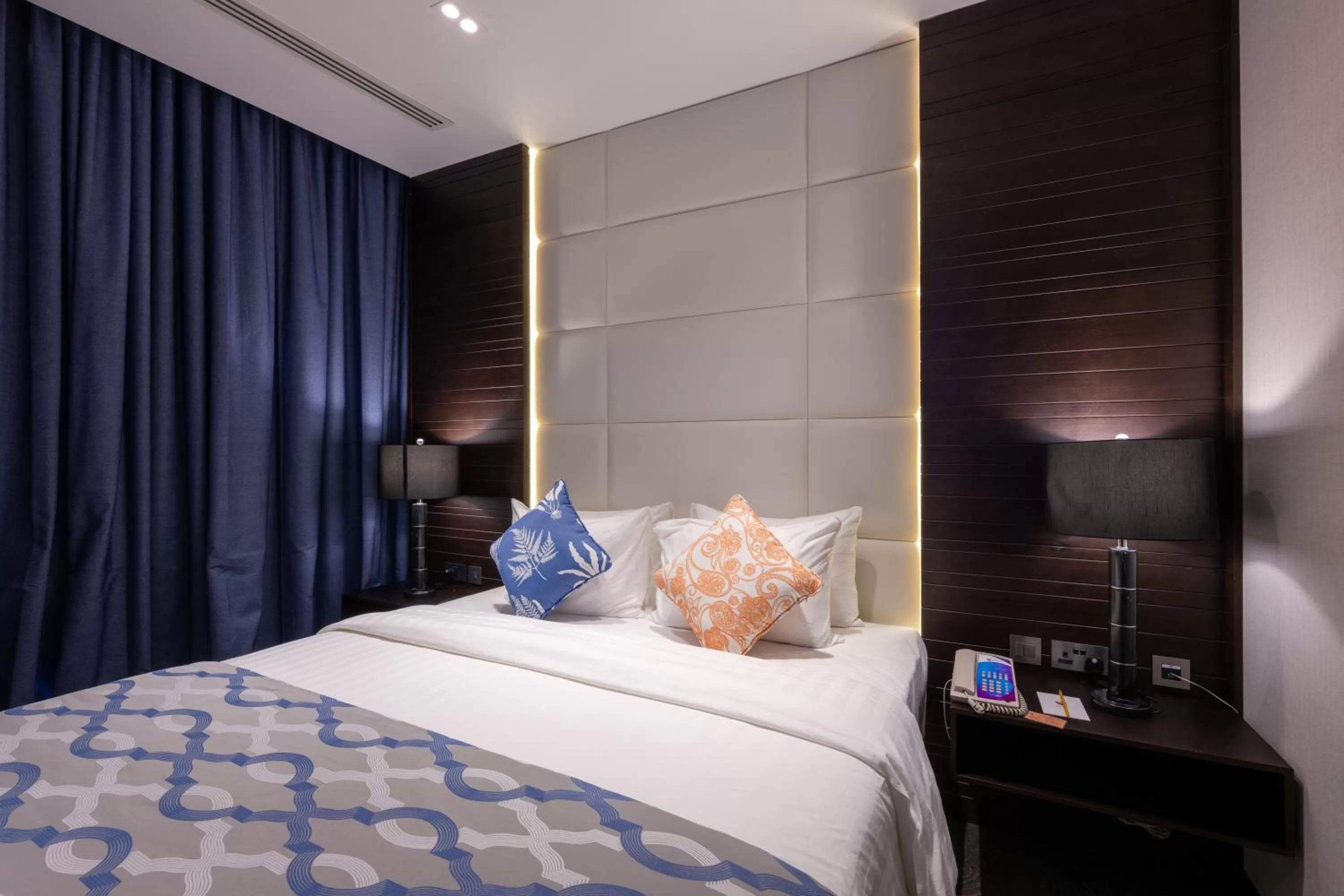 Bed in Ramada Encore Doha by Wyndham