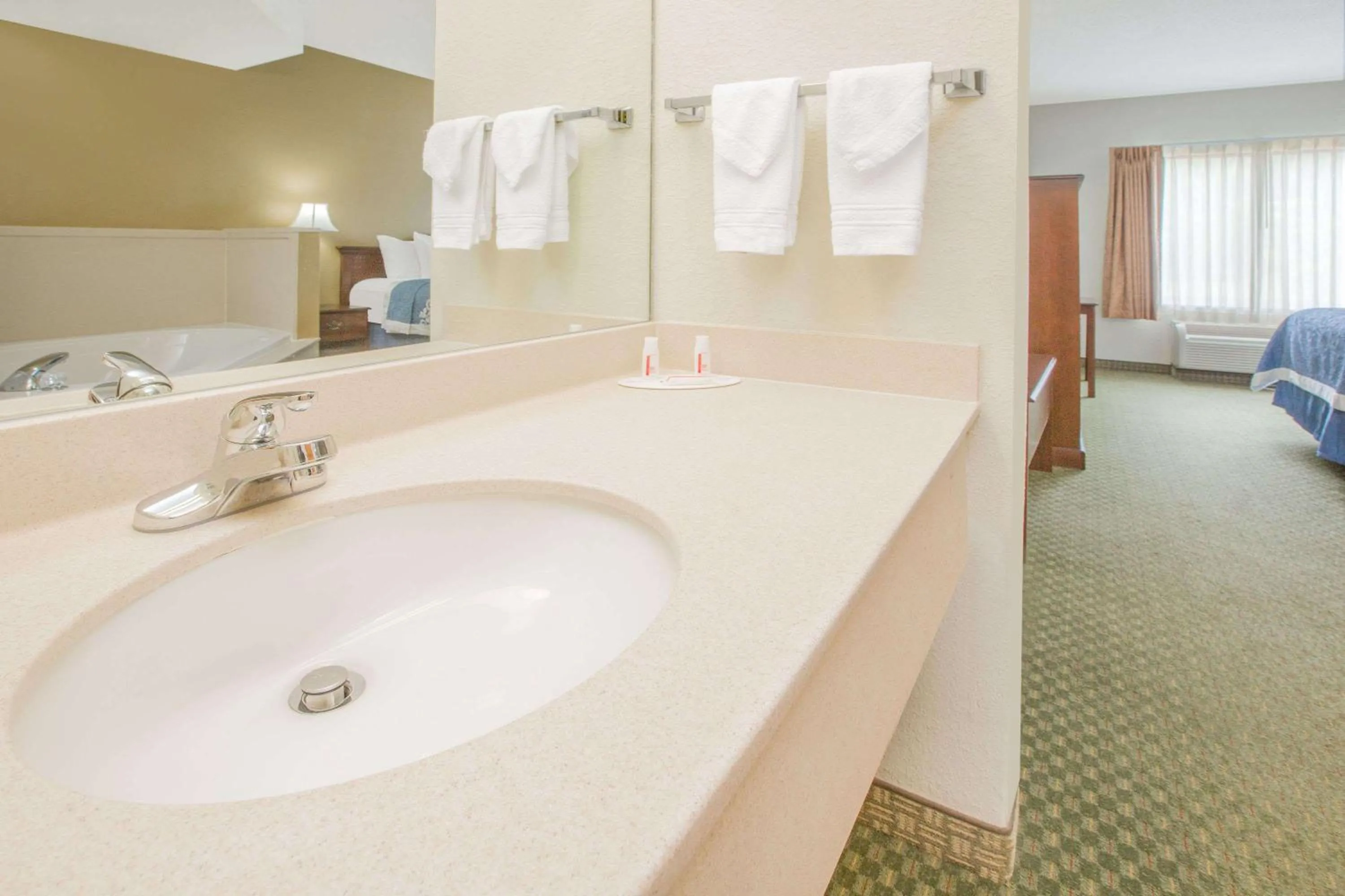 Bathroom, Bed in Days Inn by Wyndham Hattiesburg MS