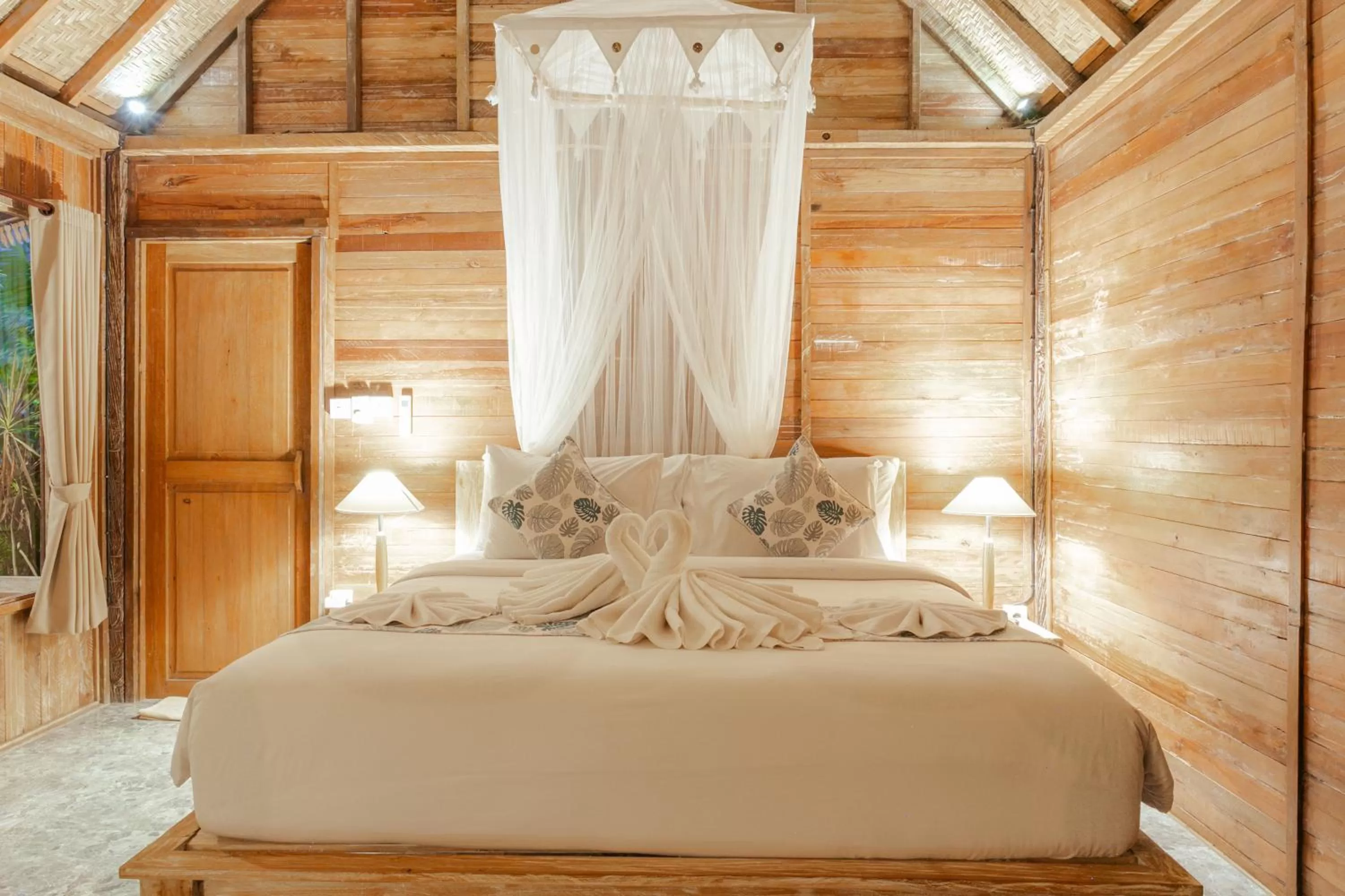 Bed in Nauna Villa Ubud