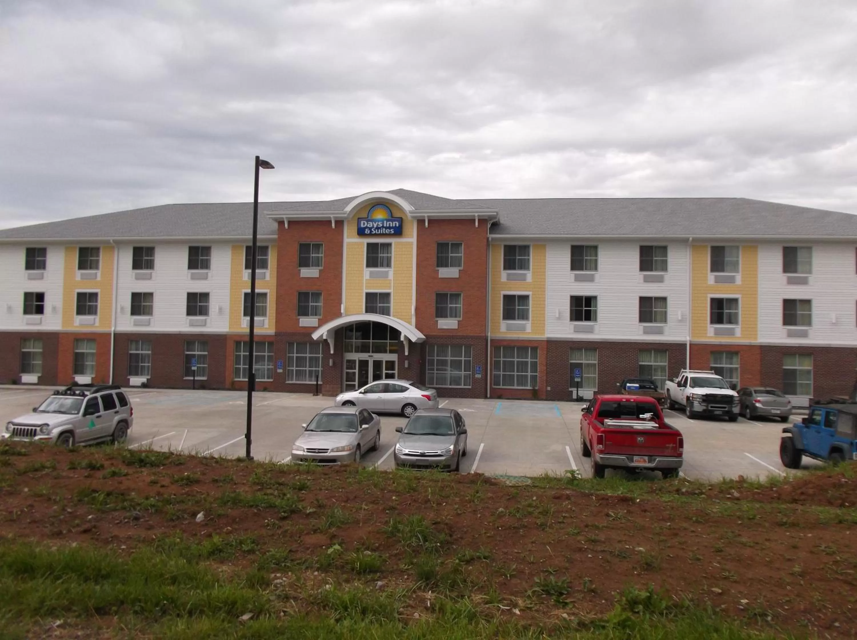 Property building in Days Inn & Suites by Wyndham Belmont