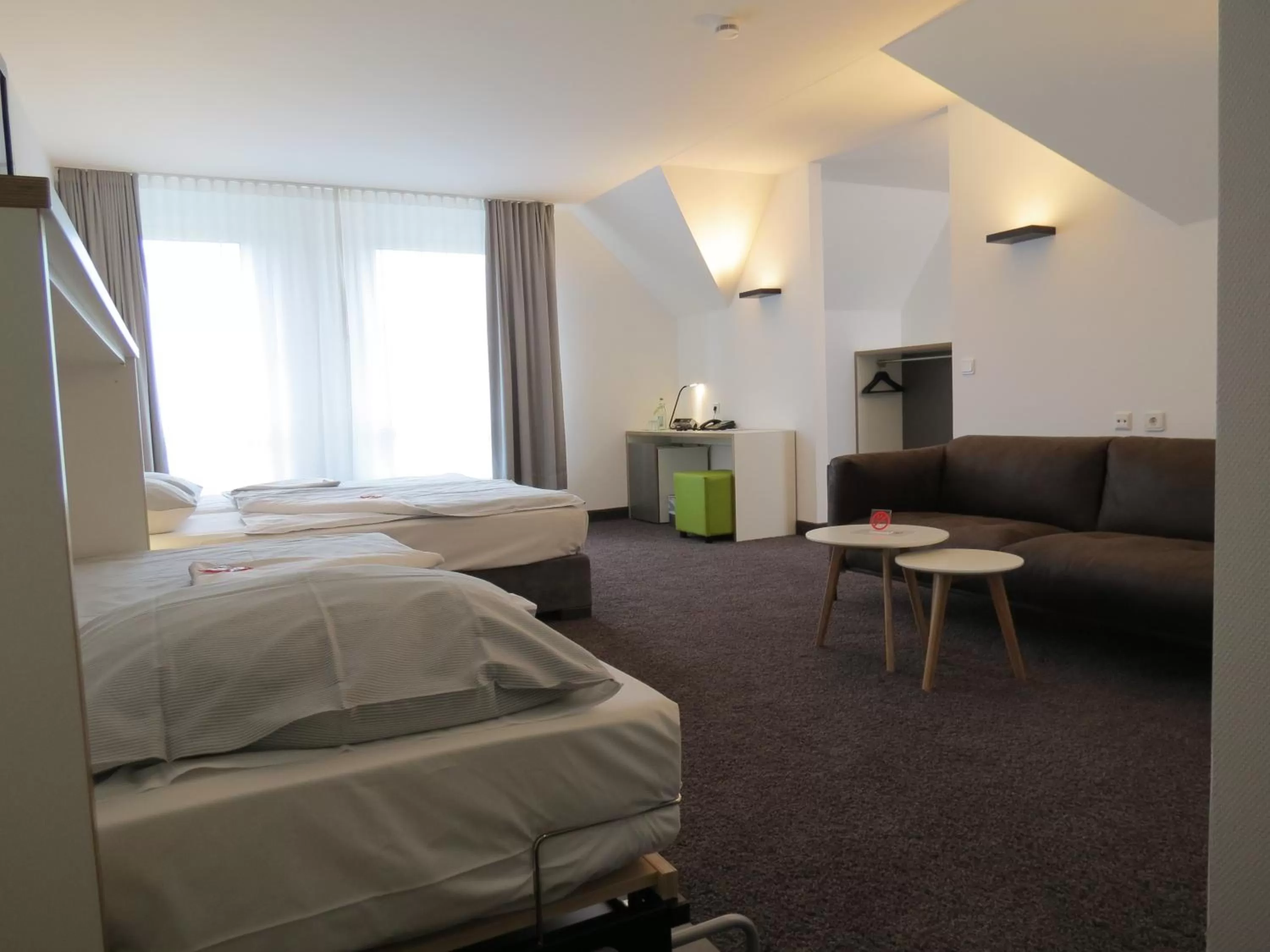 Photo of the whole room, Bed in Comfor Hotel Ulm City