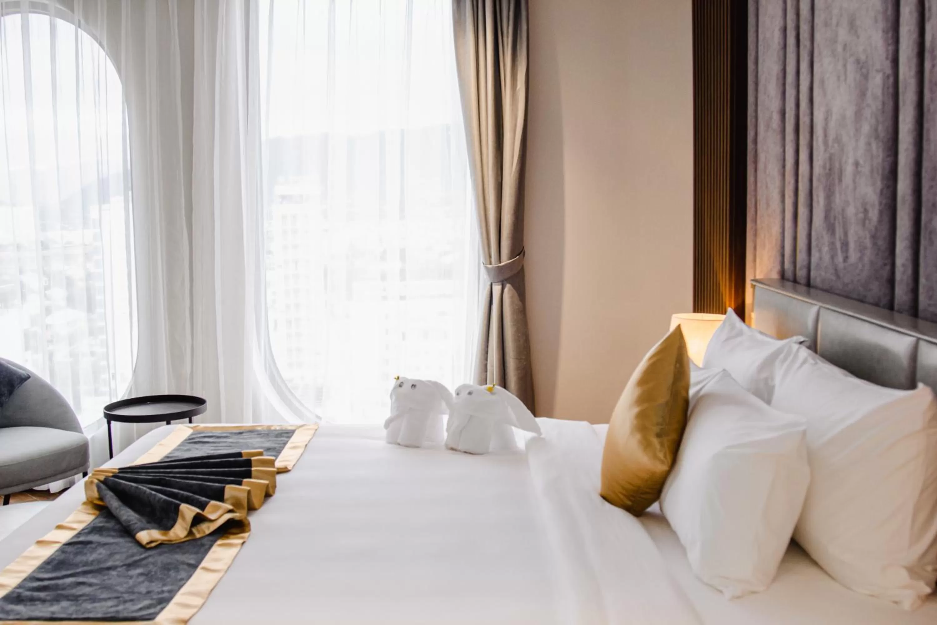 Bed in Grand Tourane Nha Trang Hotel