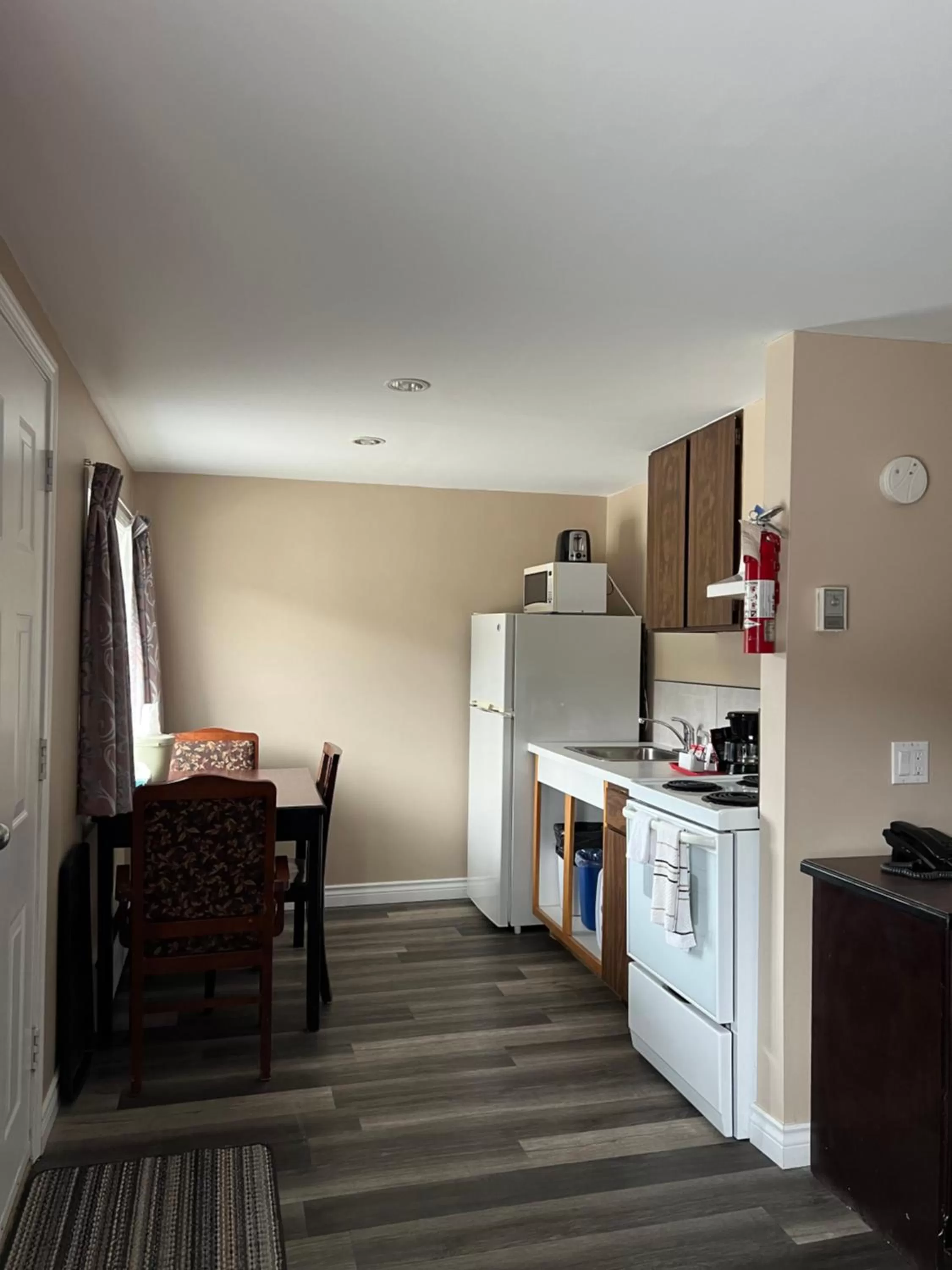 Kitchen or kitchenette in Villa Motel