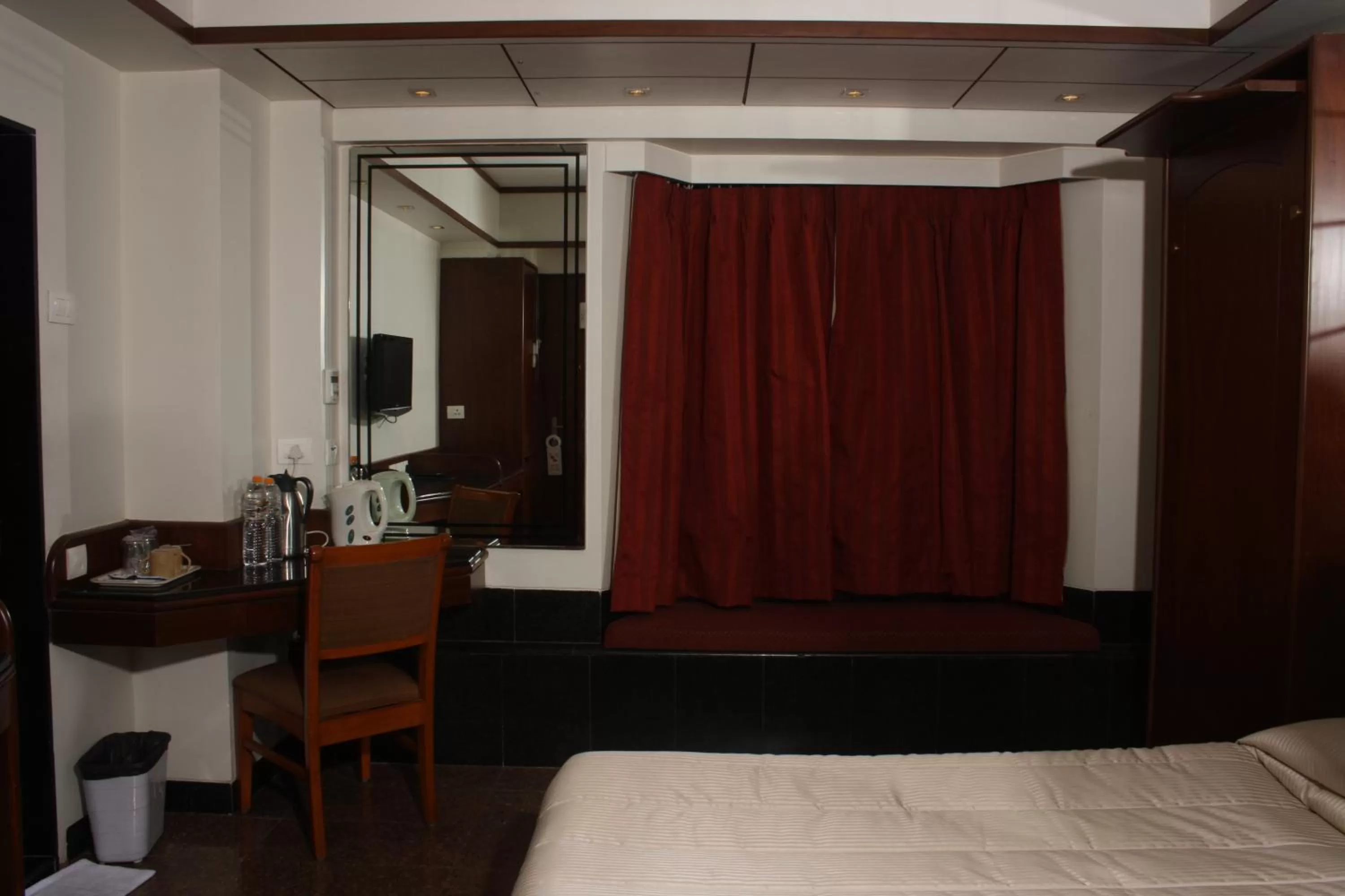 Bed in Hotel Karl Residency