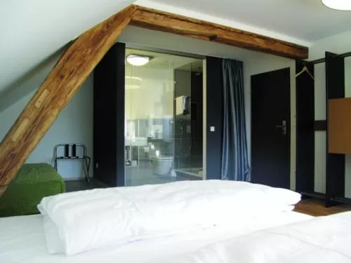 Photo of the whole room, Bed in OX Hotel