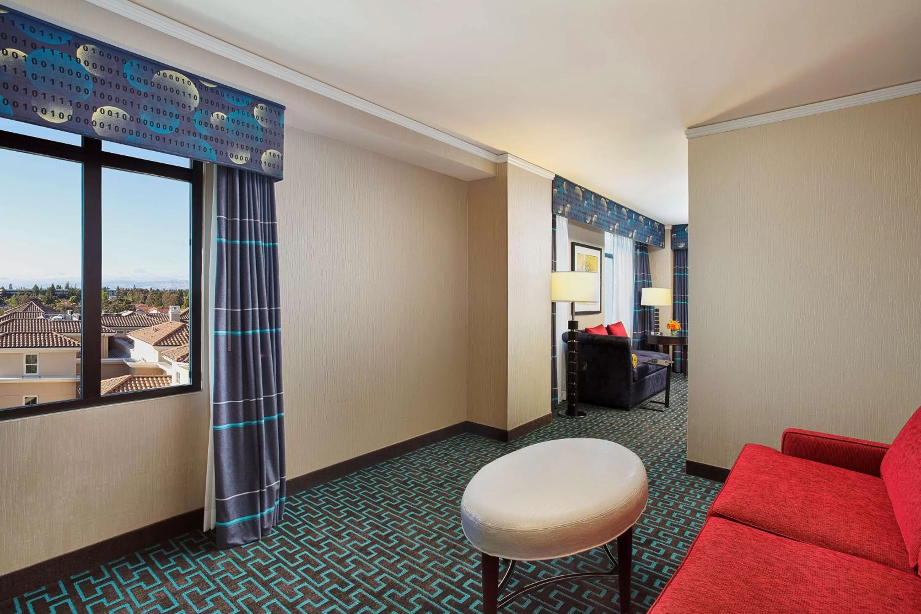 Living room in Juniper Hotel Cupertino, Curio Collection by Hilton