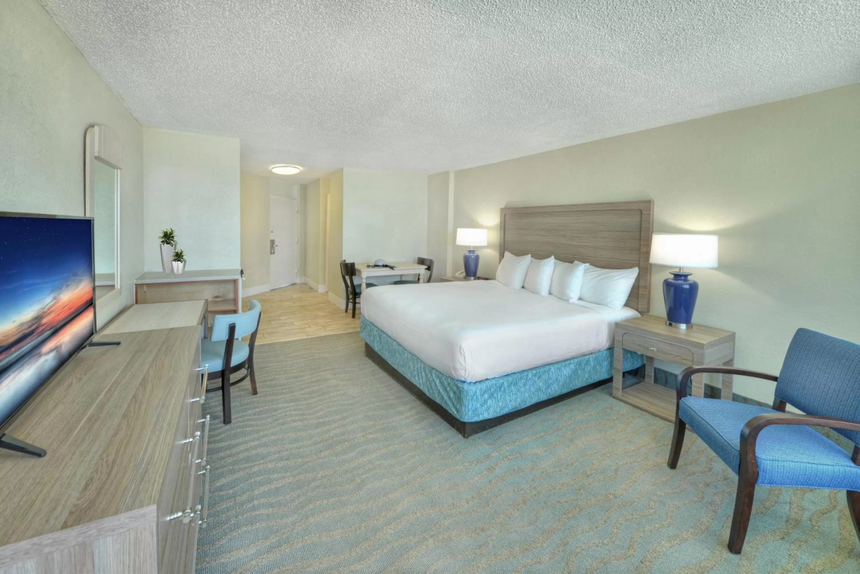 Bedroom, Bed in El Caribe Resort and Conference Center
