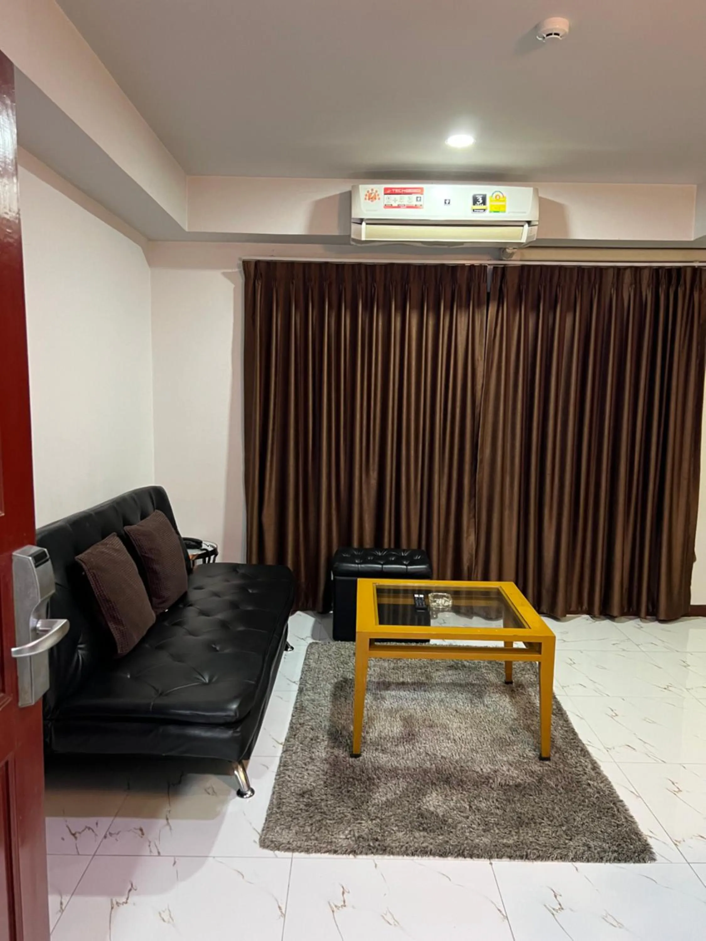 Living room in Mall Suites Hotel