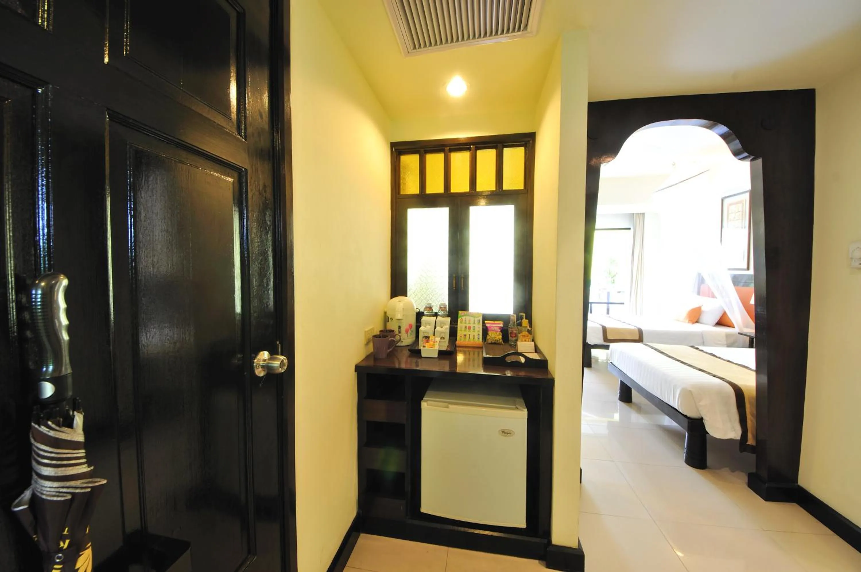 Coffee/tea facilities, Bed in Woraburi Phuket Resort & Spa - SHA Plus