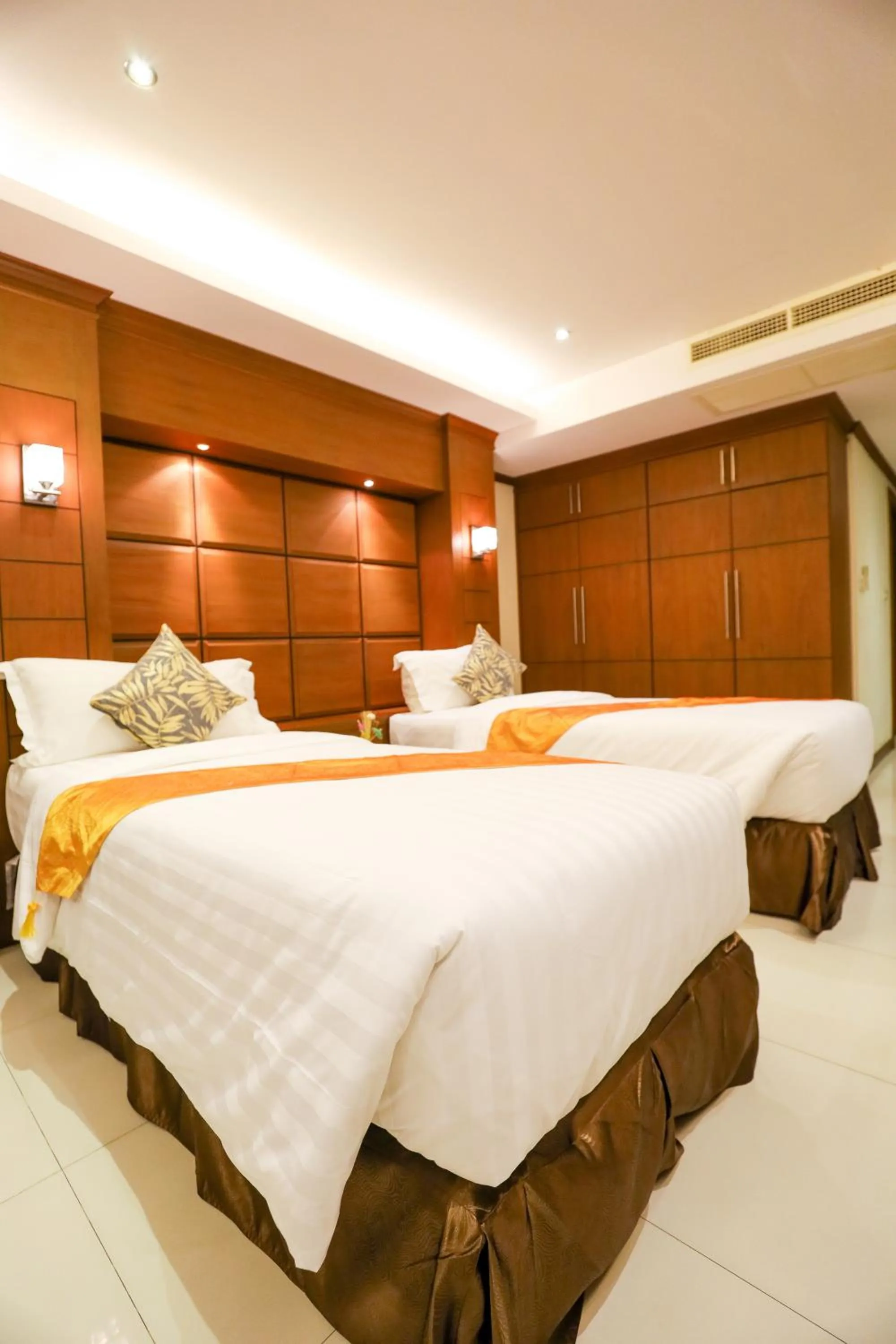 Bed in Tara Court Hotel